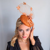 Burnt orange flower fascinator hat
