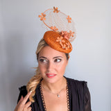 Burnt orange flower fascinator hat
