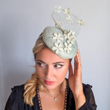 Light aquamarine blue flower fascinator hat