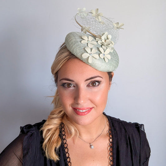 Light aquamarine blue flower fascinator hat