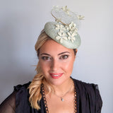 Light aquamarine blue flower fascinator hat