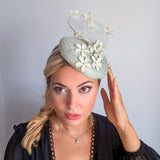 Light aquamarine blue flower fascinator hat