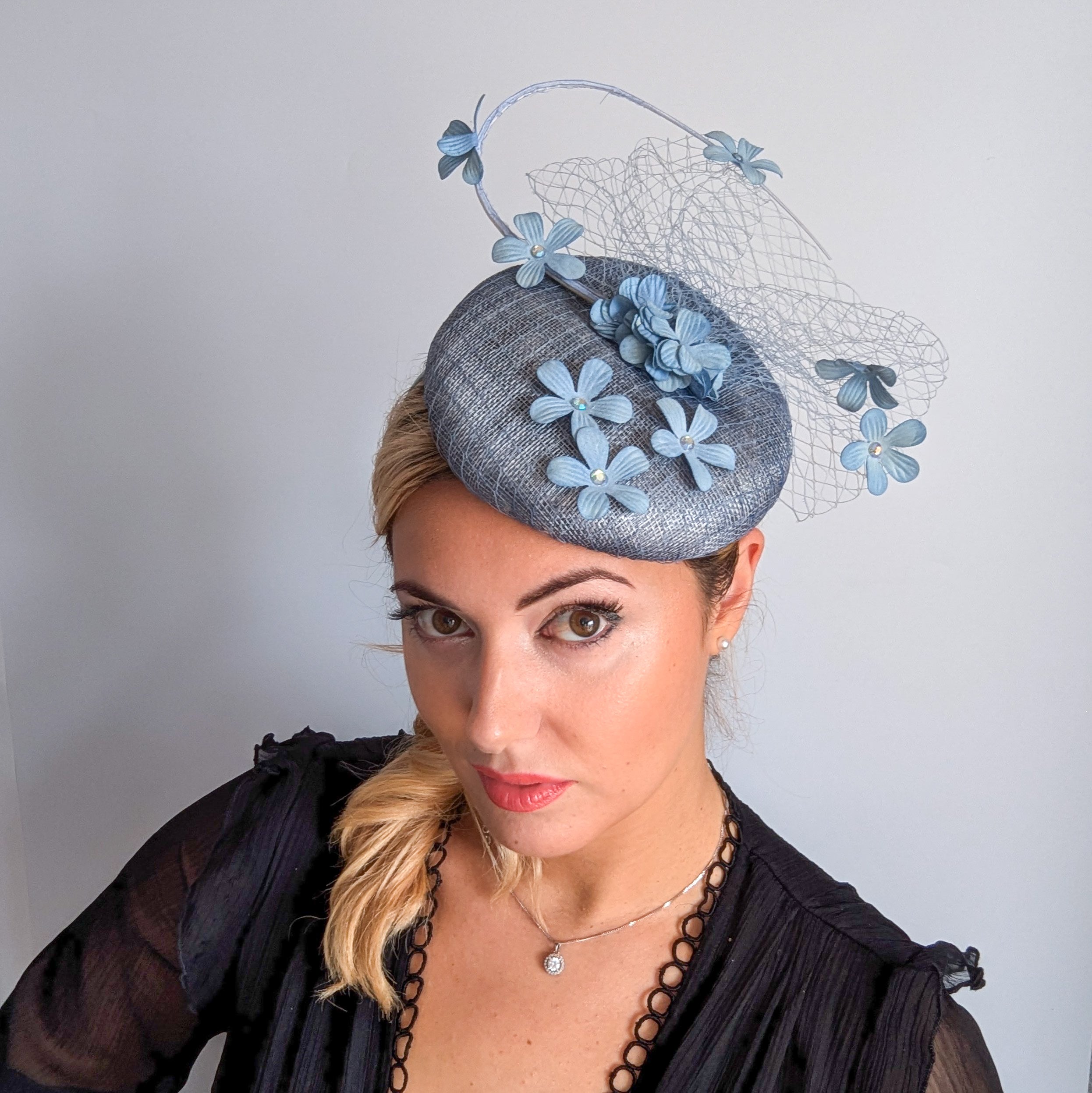 Cool dusty blue flower fascinator hat