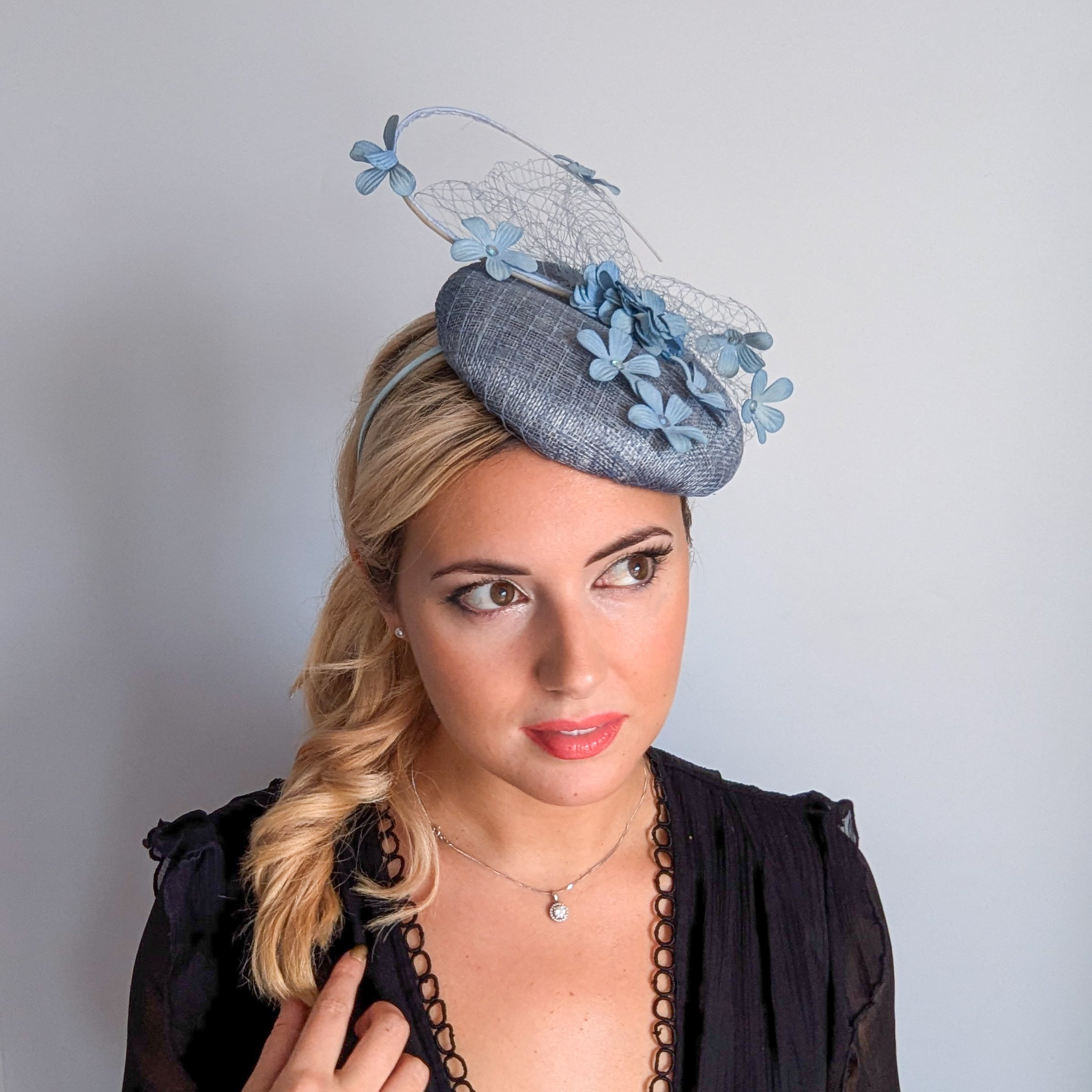 Cool dusty blue flower fascinator hat