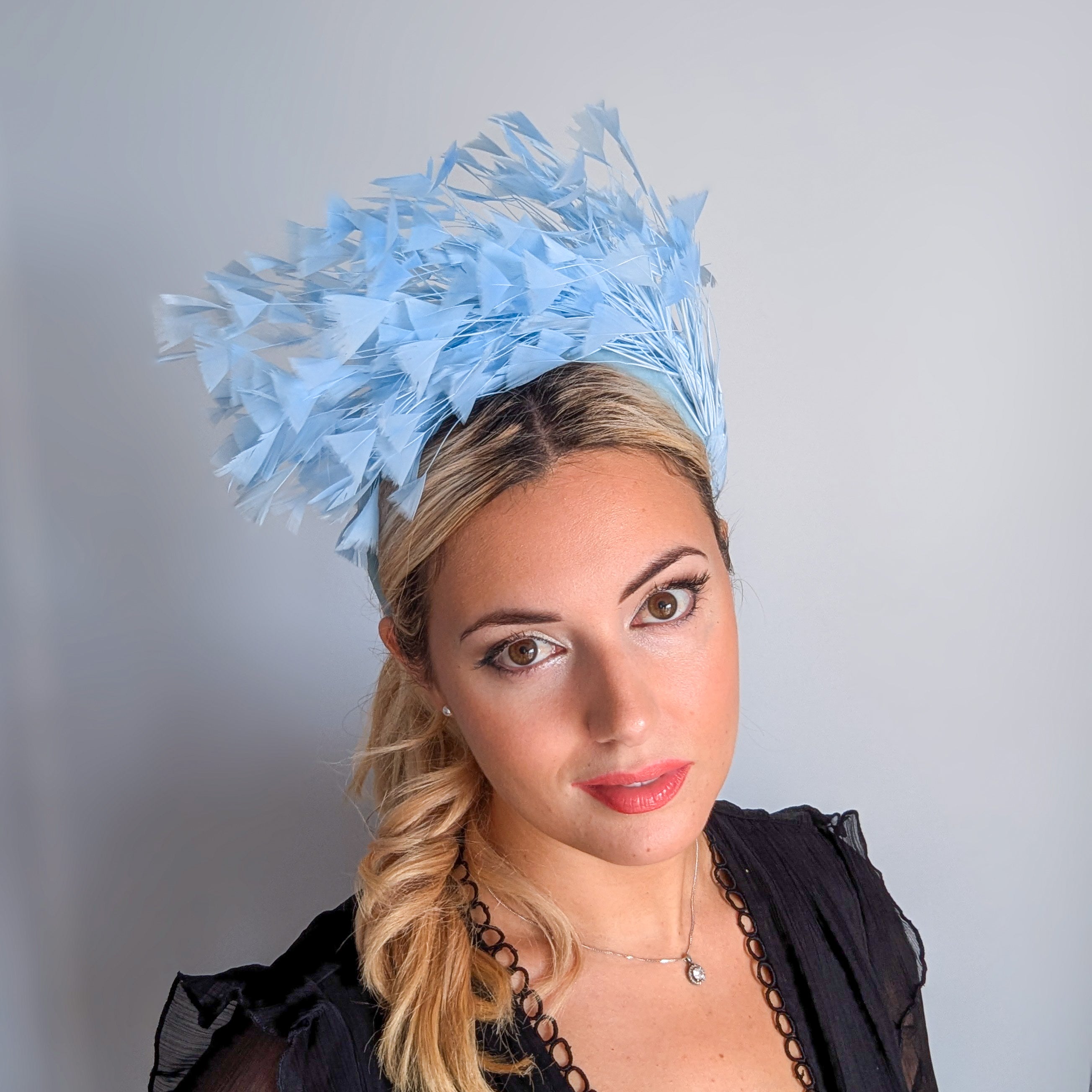Light cornflower blue feather padded velvet headband fascinator