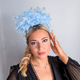 Light cornflower blue feather padded velvet headband fascinator