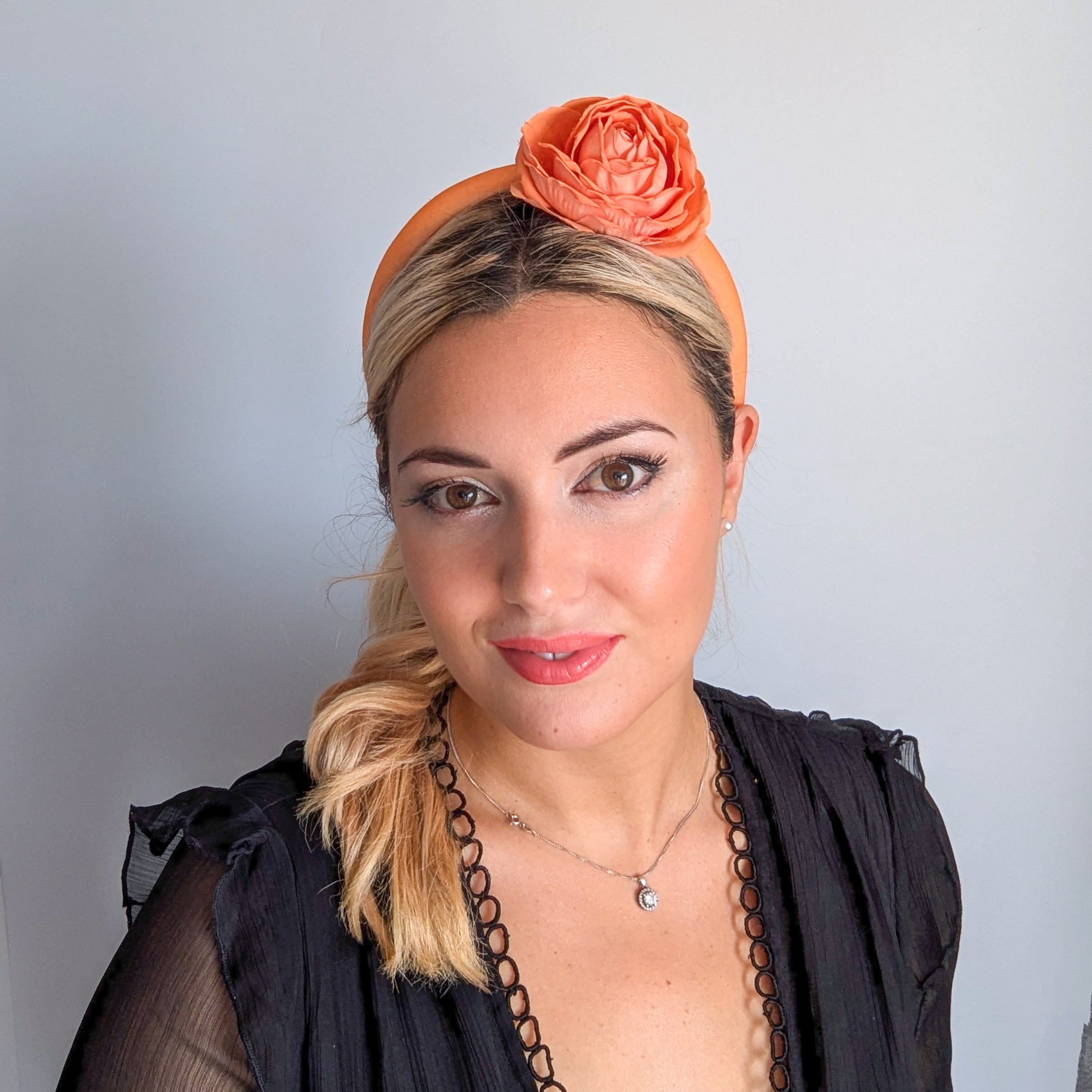 Light orange flower padded velvet headband fascinator