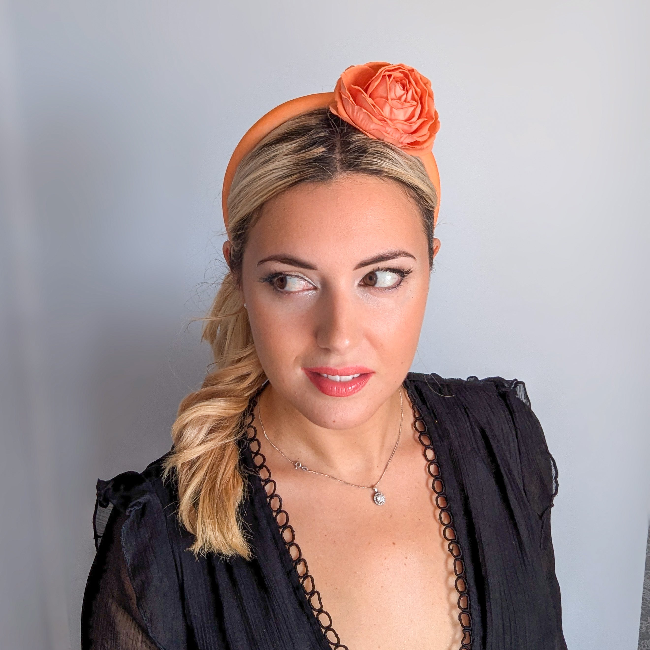 Light orange flower padded velvet headband fascinator