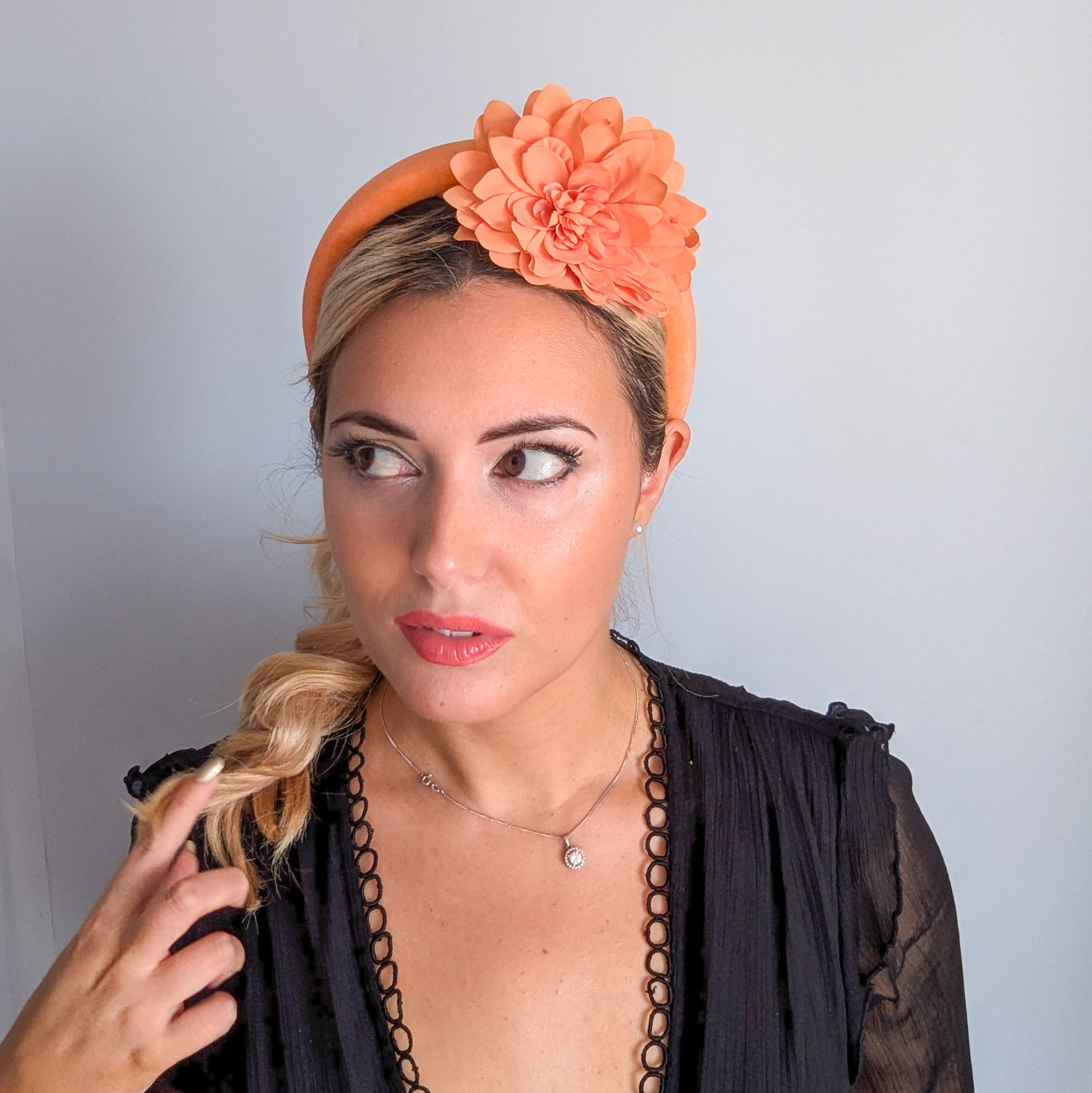 Light orange flower padded velvet headband fascinator