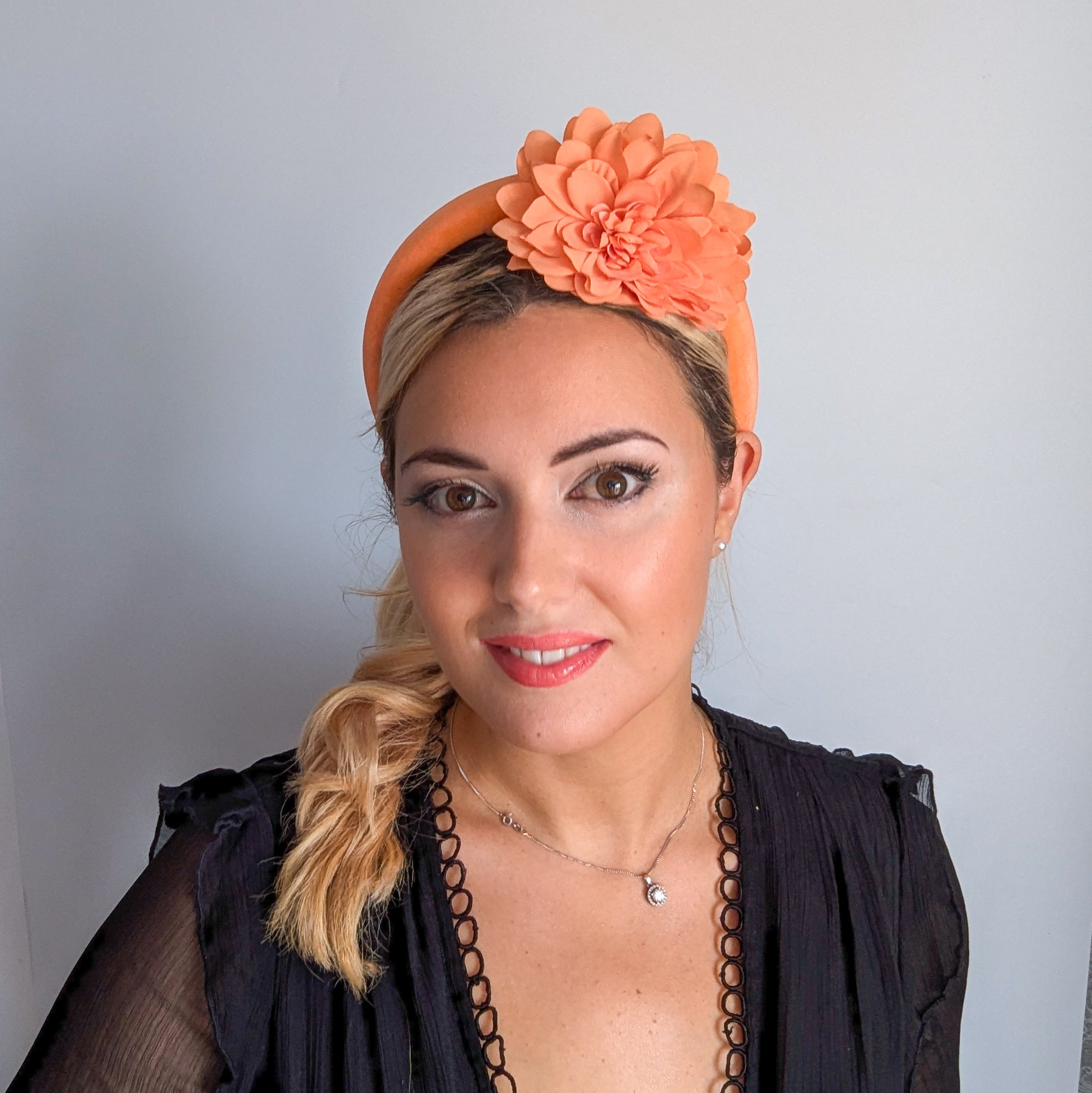 Light orange flower padded velvet headband fascinator