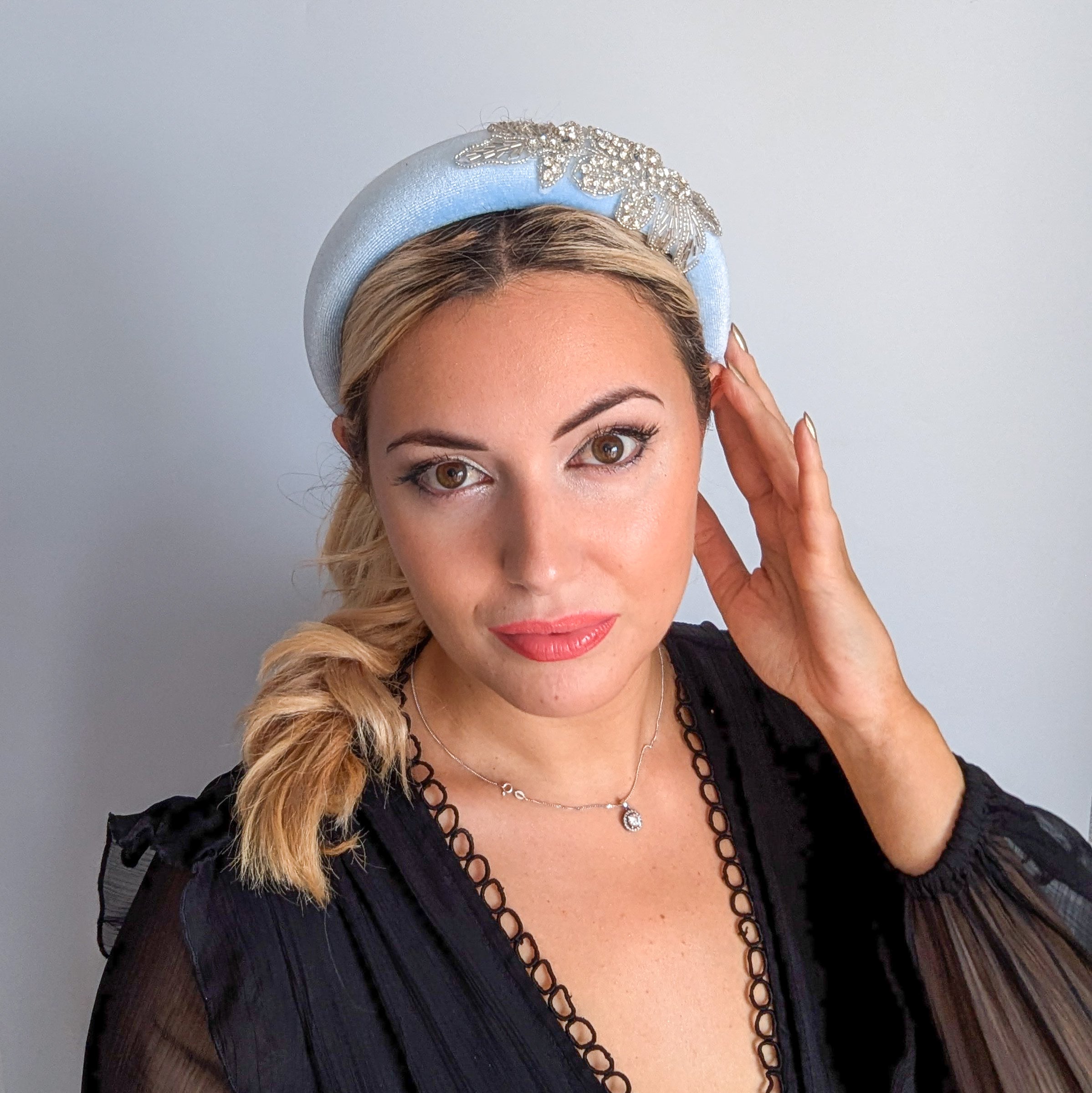Light baby blue crystal padded velvet headband fascinator