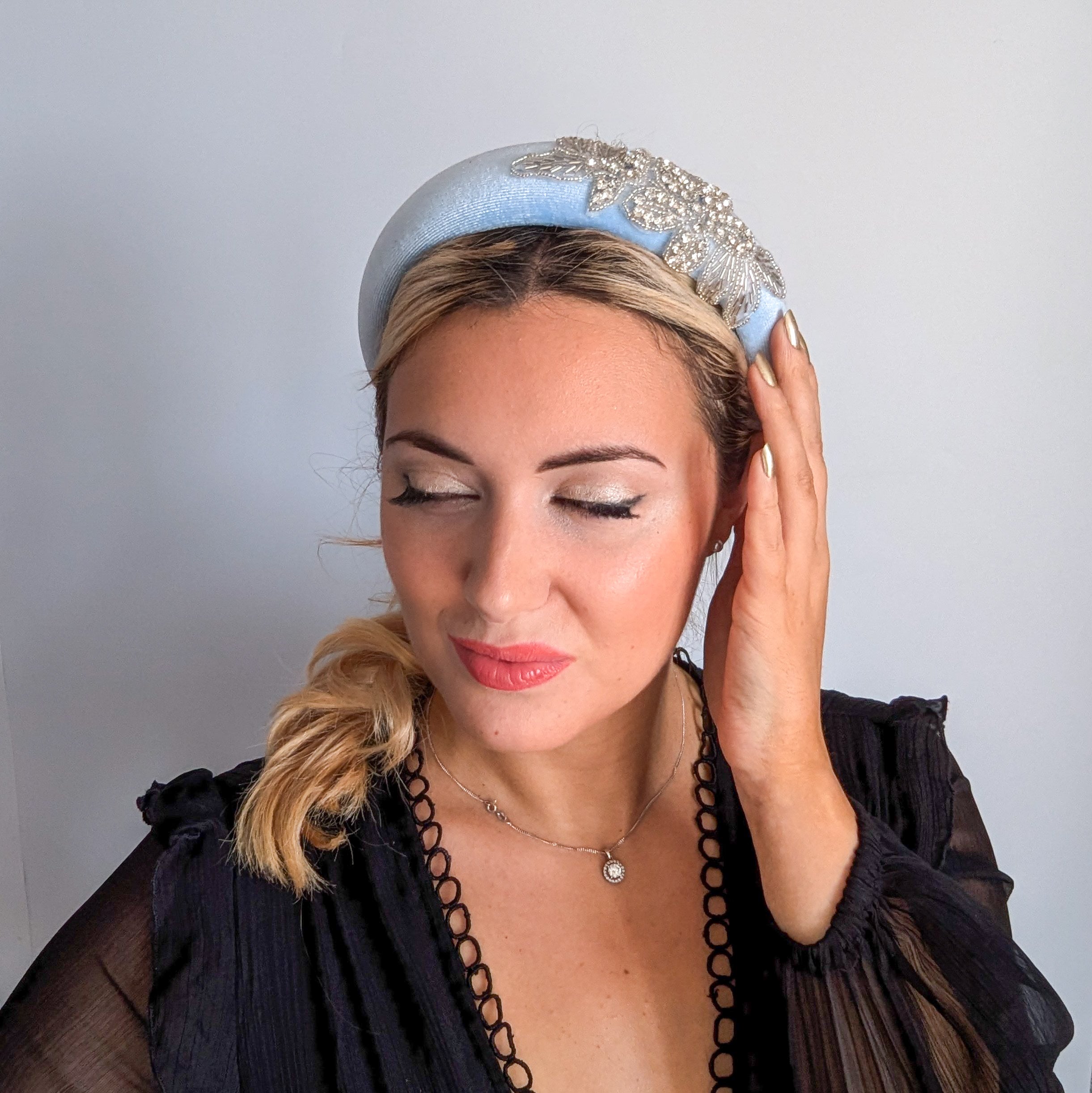 Light baby blue crystal padded velvet headband fascinator