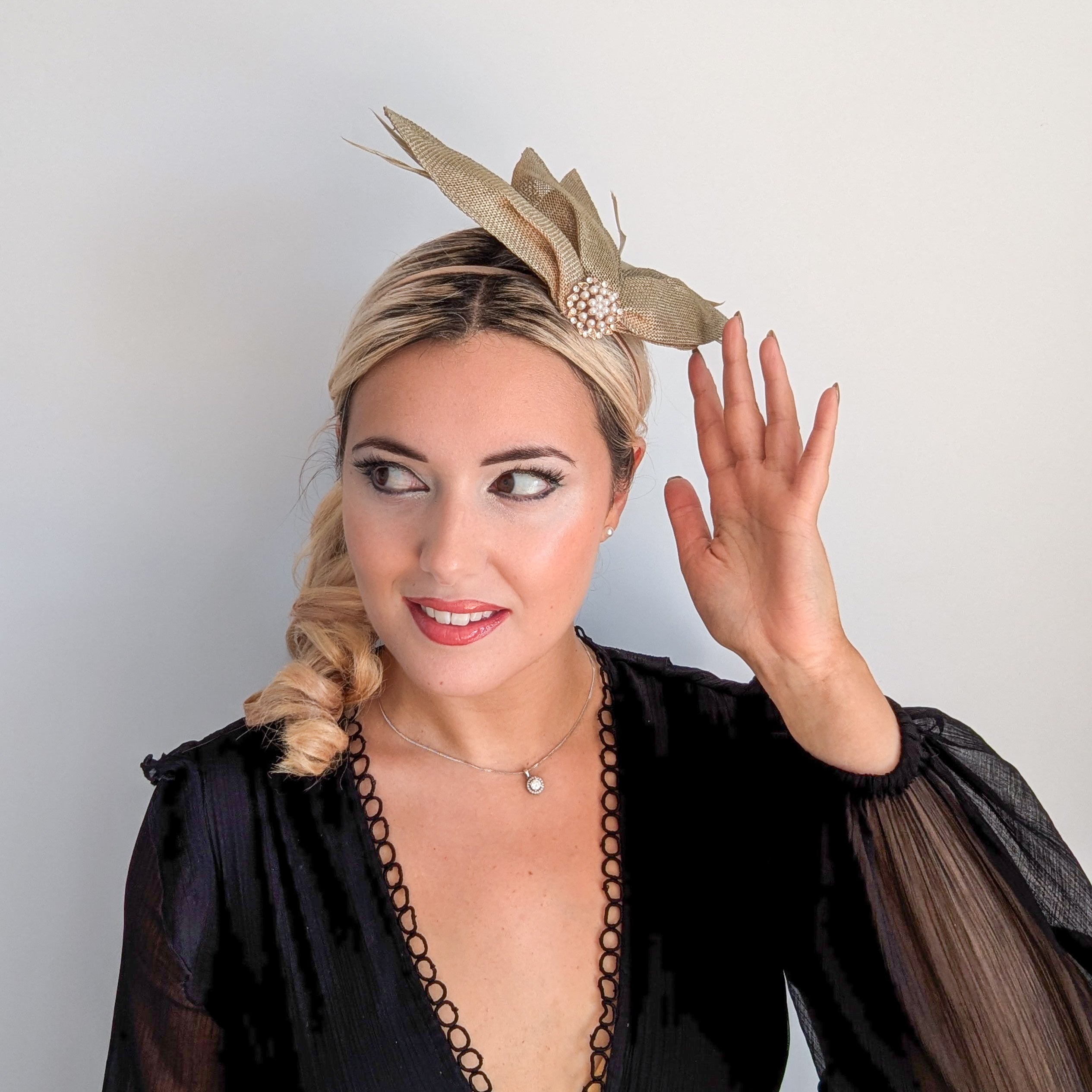 Gold shimmer feather petal fan fascinator hat