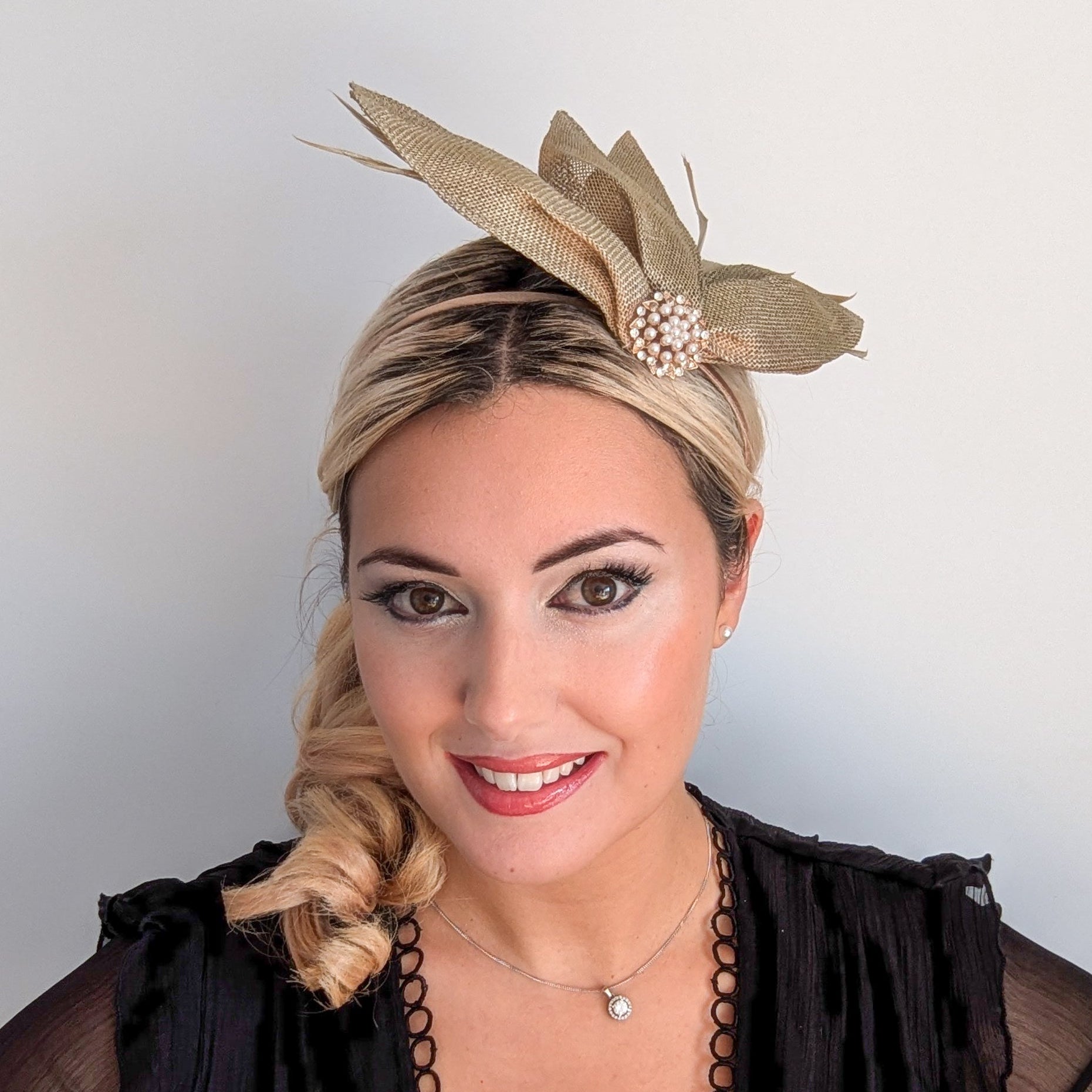 Gold shimmer feather petal fan fascinator hat