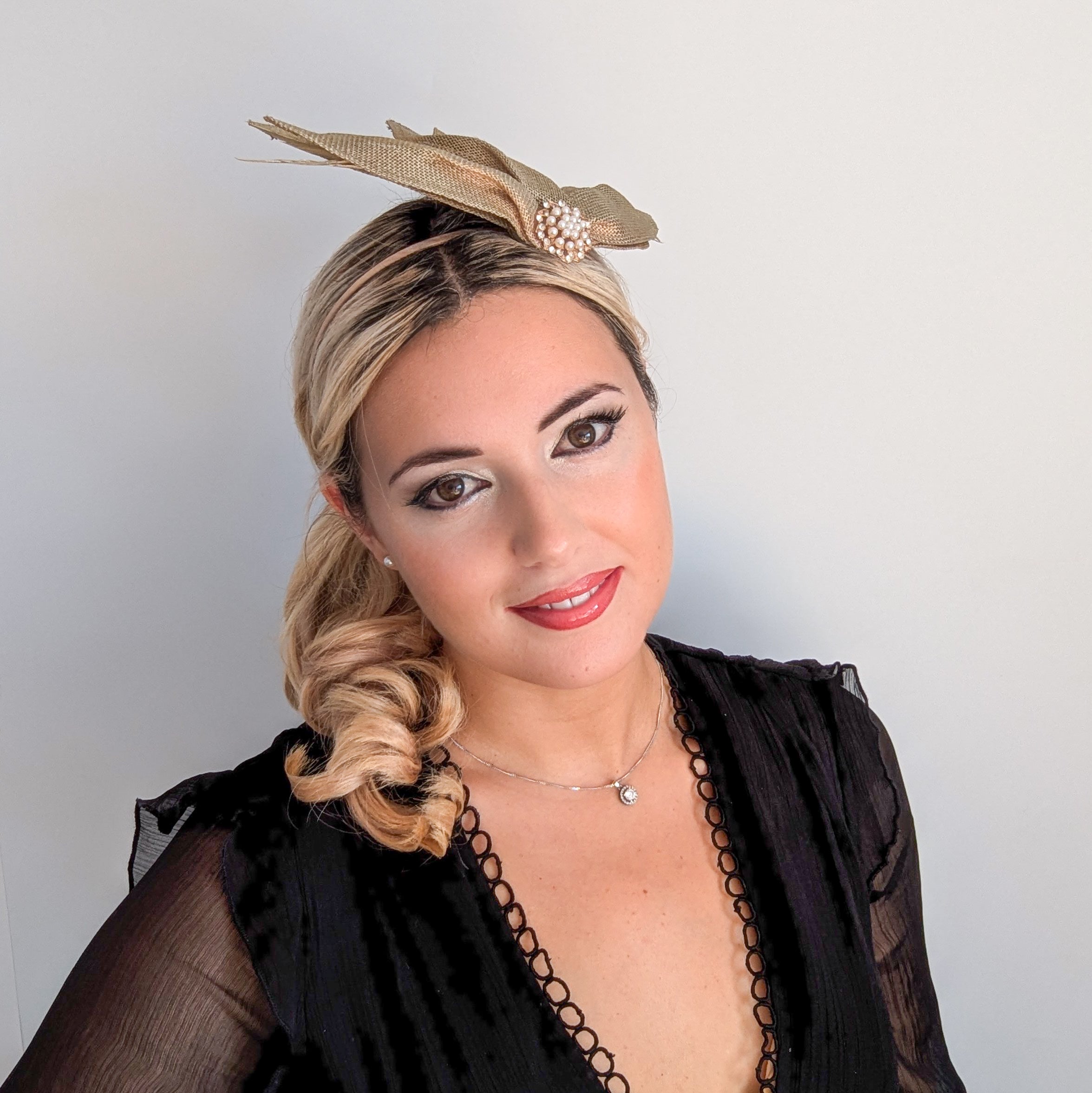 Gold shimmer feather petal fan fascinator hat