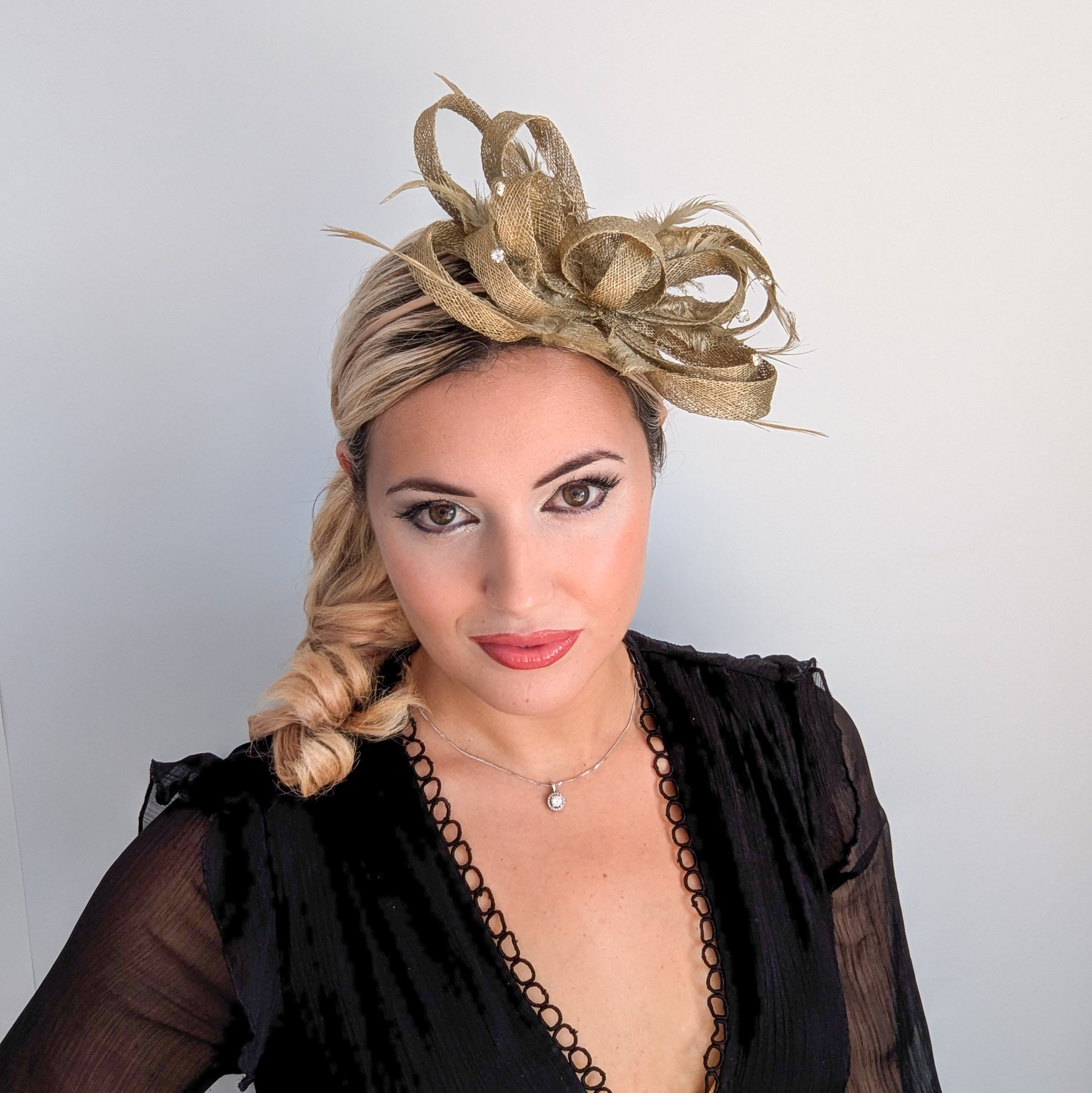 Gold shimmer crystal feather fascinator hat