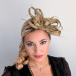 Gold shimmer crystal feather fascinator hat