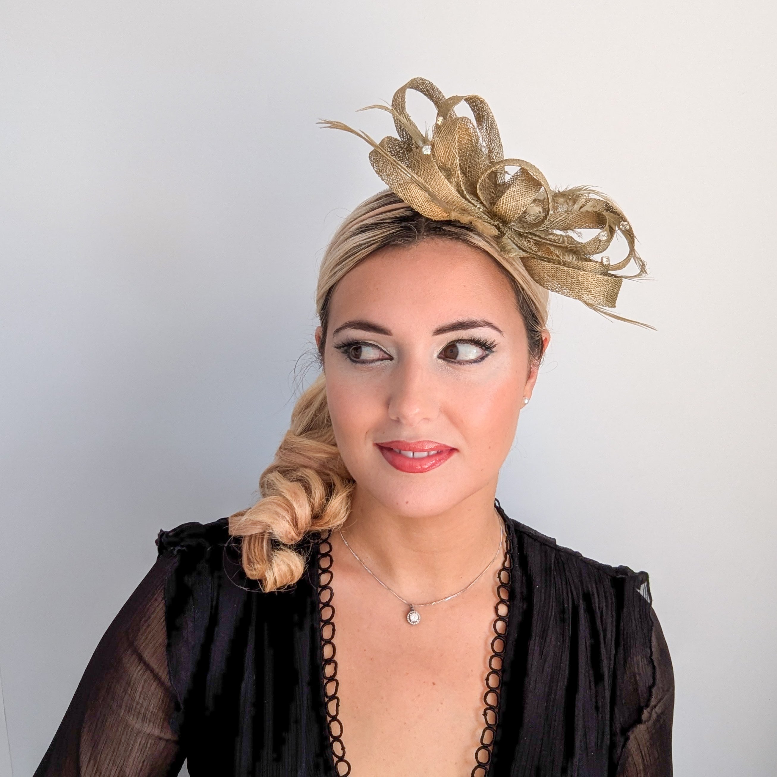 Gold shimmer crystal feather fascinator hat