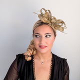 Gold shimmer crystal feather fascinator hat