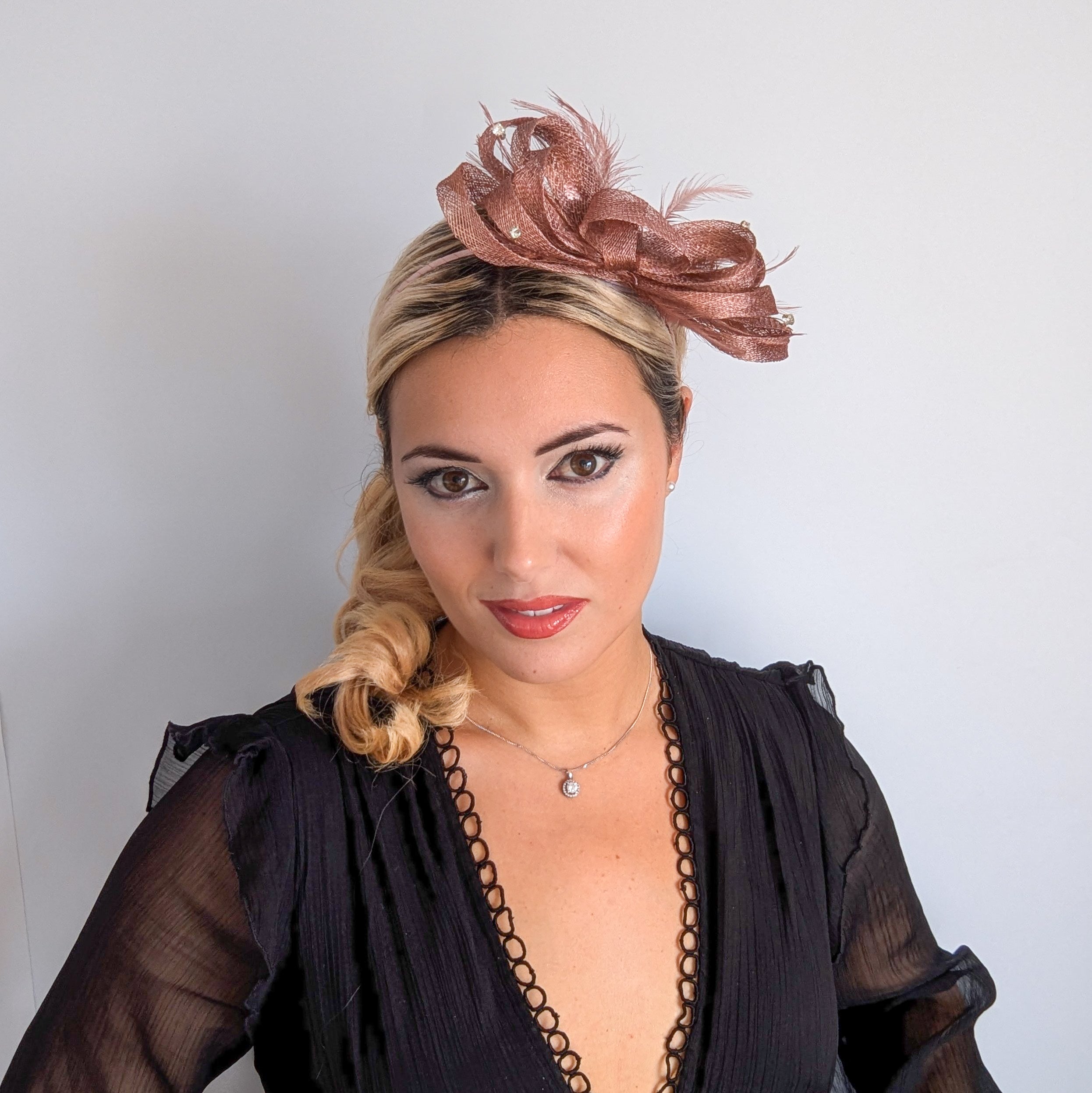 Rose gold shimmer crystal feather fascinator hat