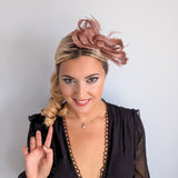 Rose gold shimmer crystal feather fascinator hat