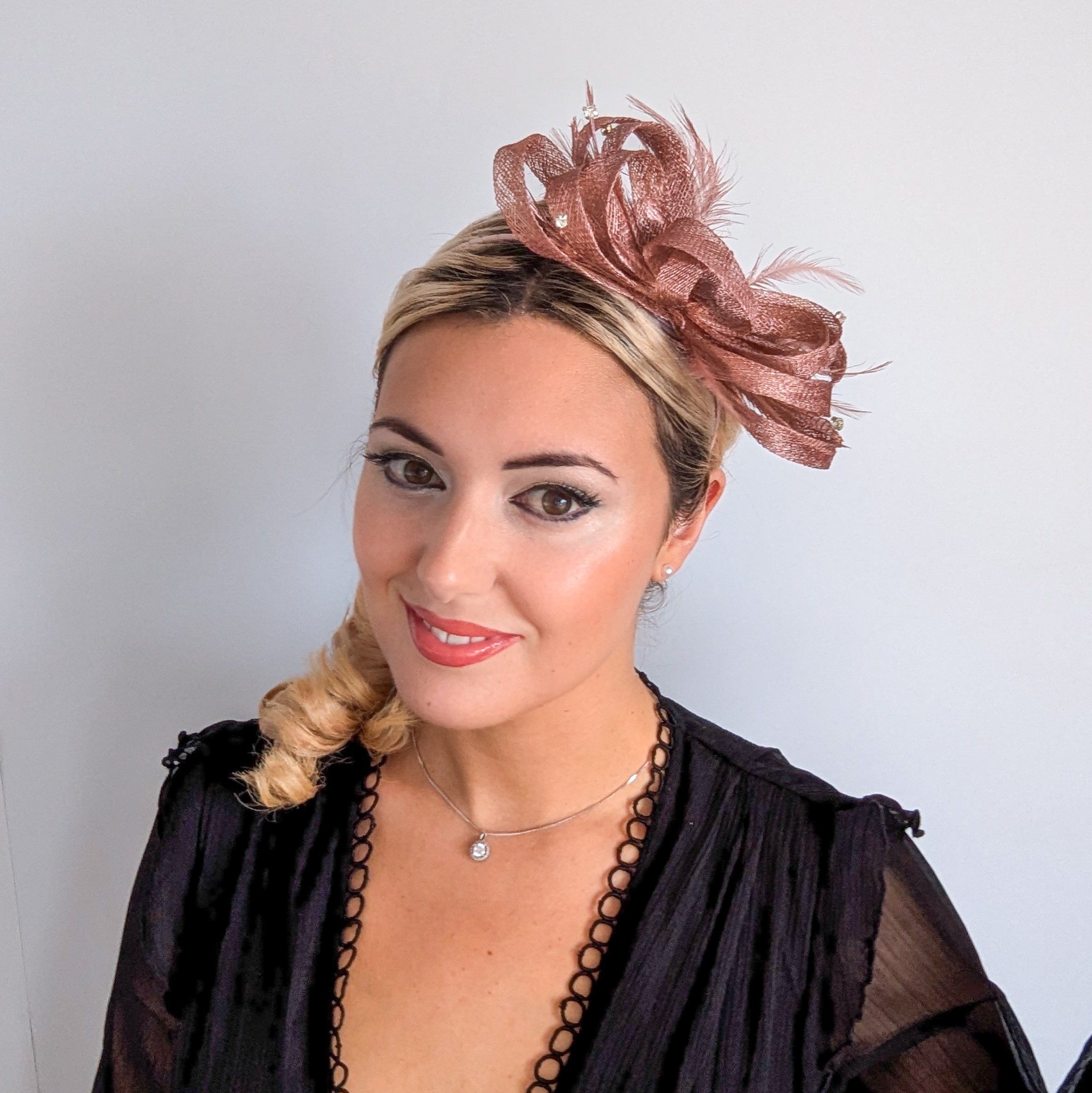 Rose gold shimmer crystal feather fascinator hat