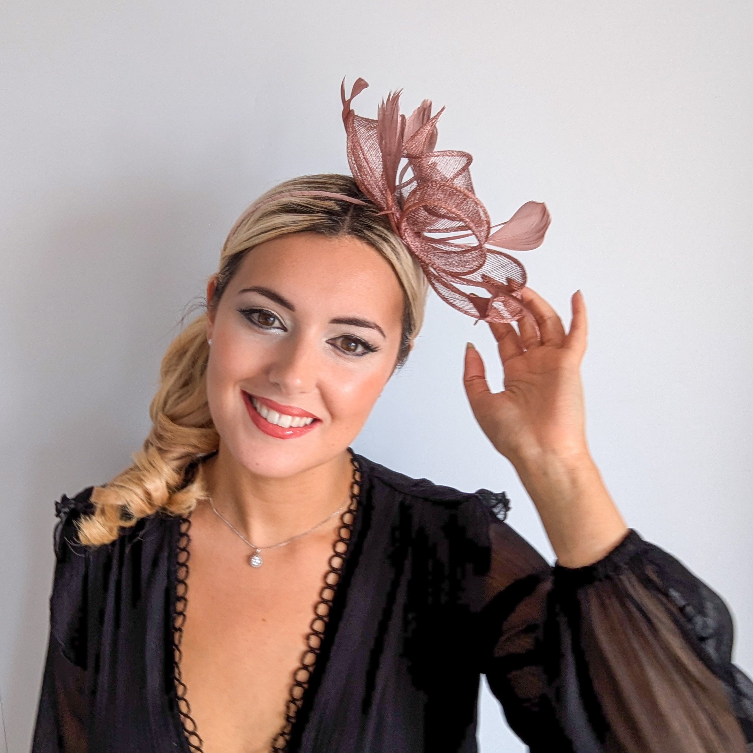Rose gold shimmer feather fascinator hat