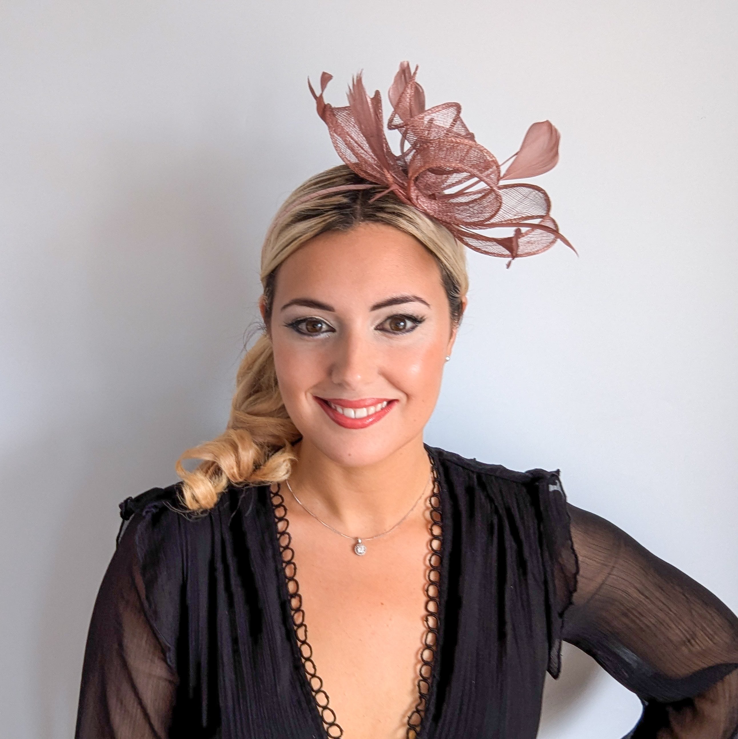 Rose gold shimmer feather fascinator hat