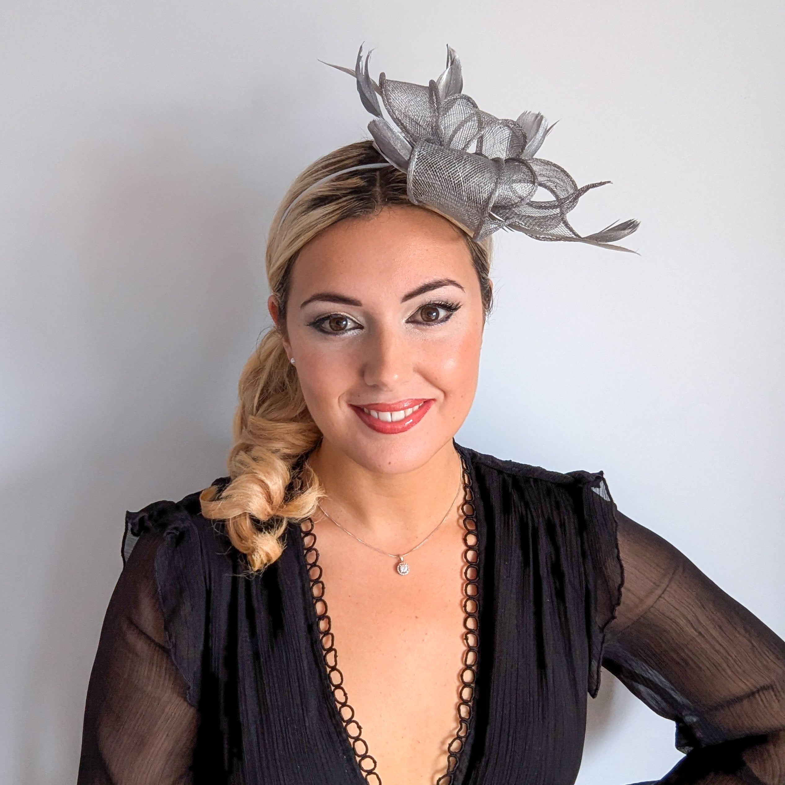 Silver shimmer feather fascinator hat