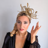 Gold shimmer feather fascinator hat House of Hats