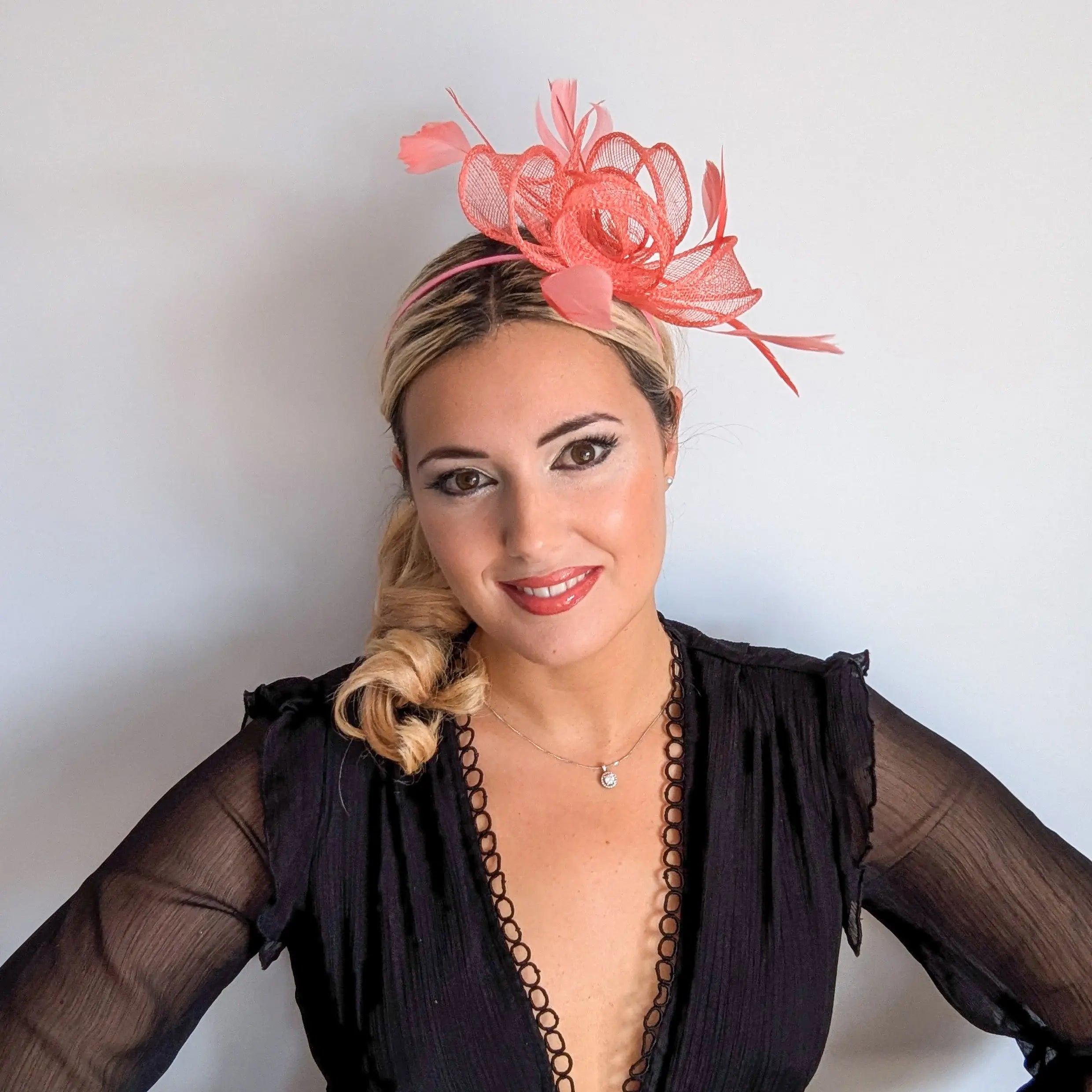 Watermelon coral feather fascinator hat House of Hats