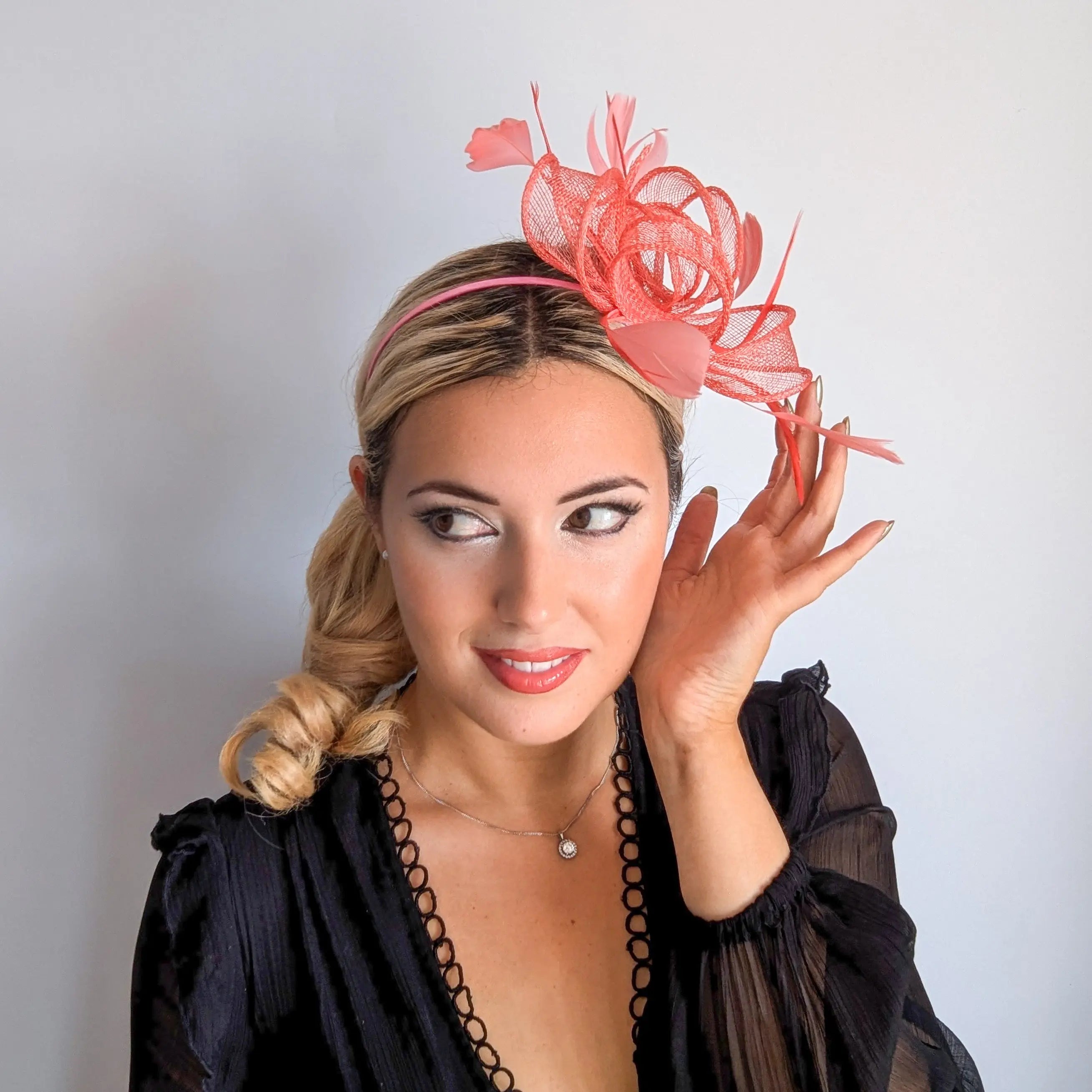 Watermelon coral feather fascinator hat House of Hats