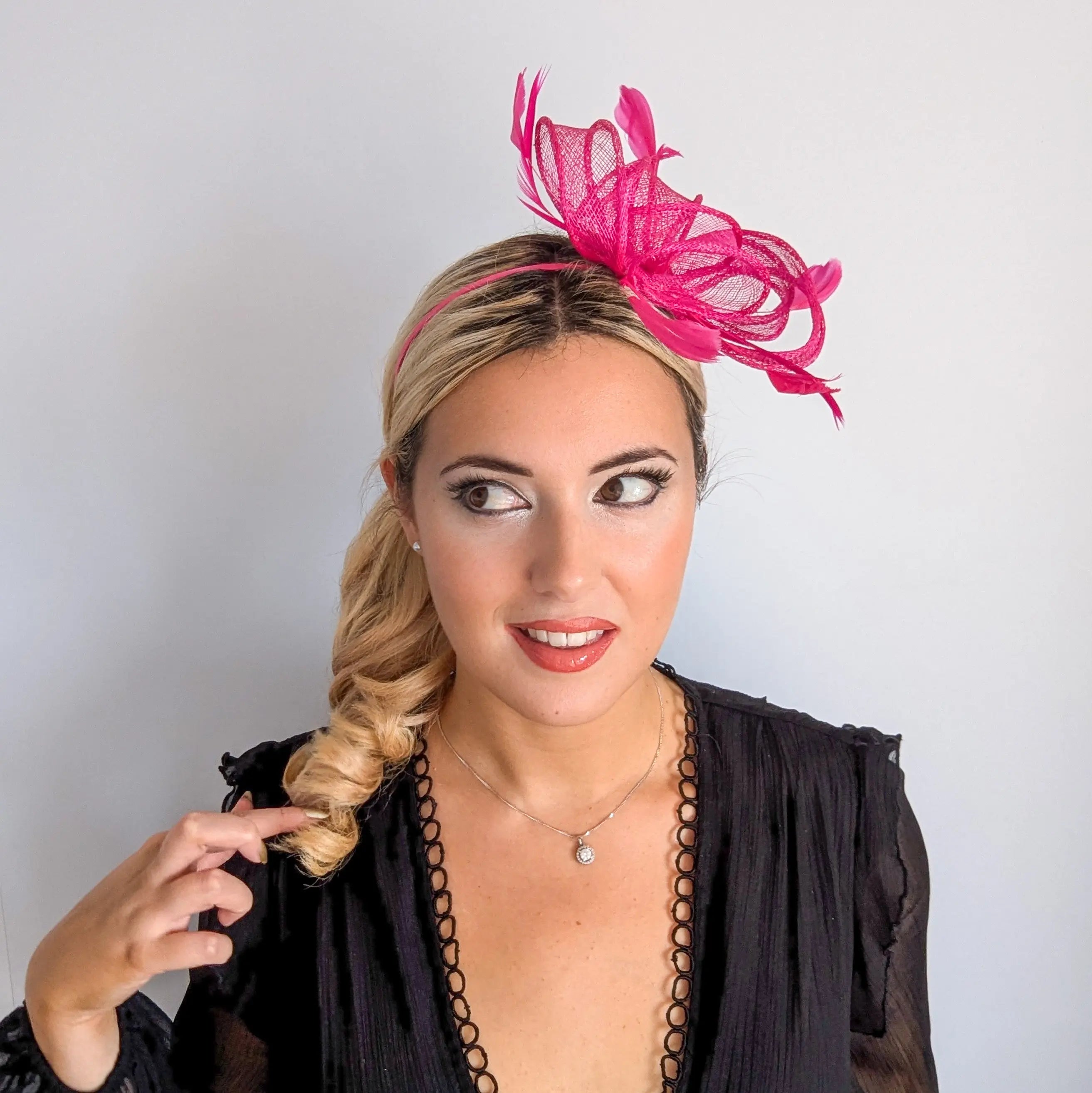 Hot pink feather fascinator hat House of Hats