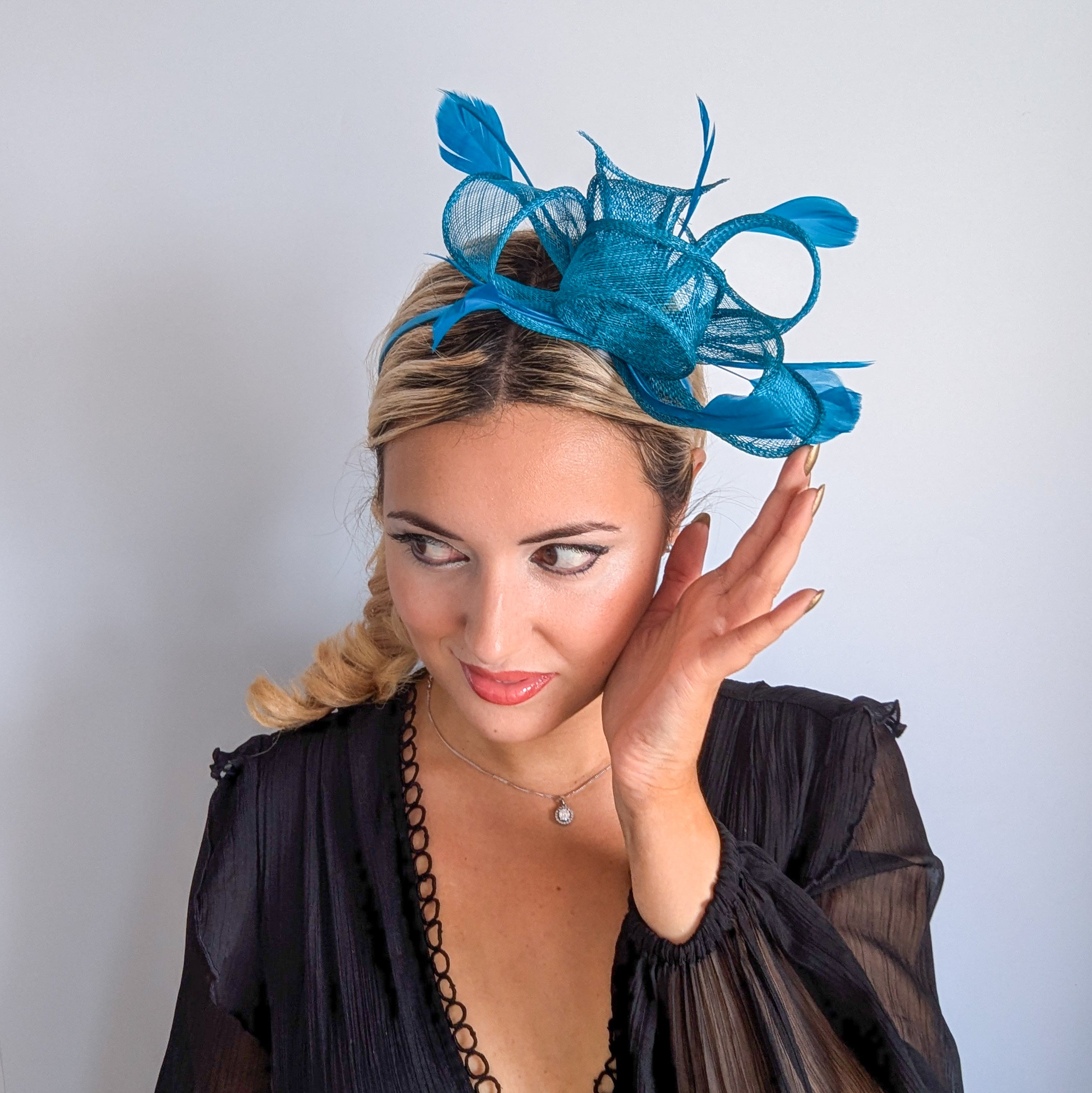 Dark acqua blue feather fascinator hat