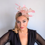 Light peach pink feather fascinator hat