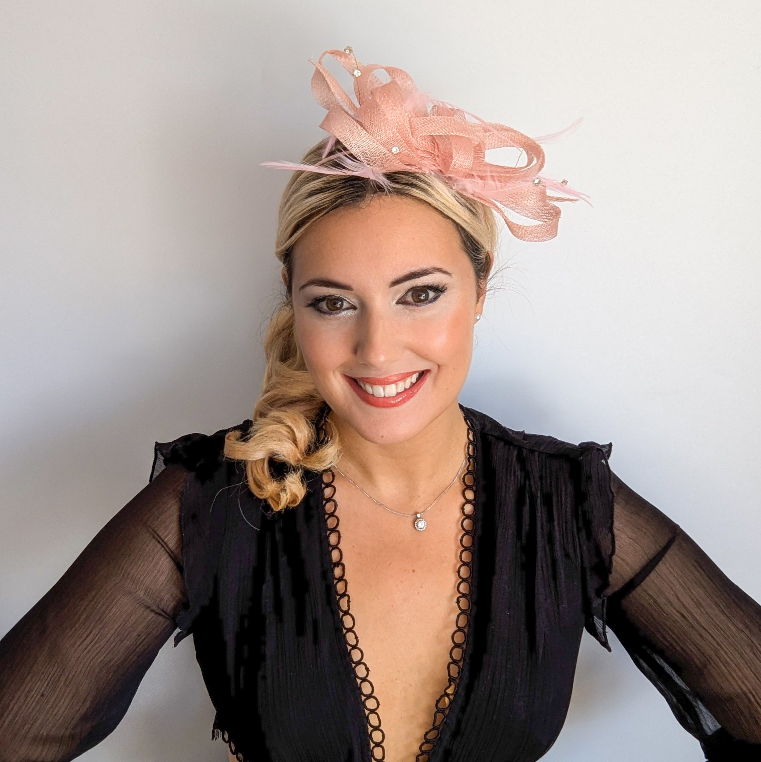 Light pink crystal feather fascinator hat