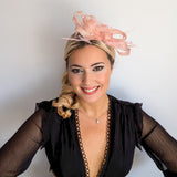 Light peach pink crystal feather fascinator hat