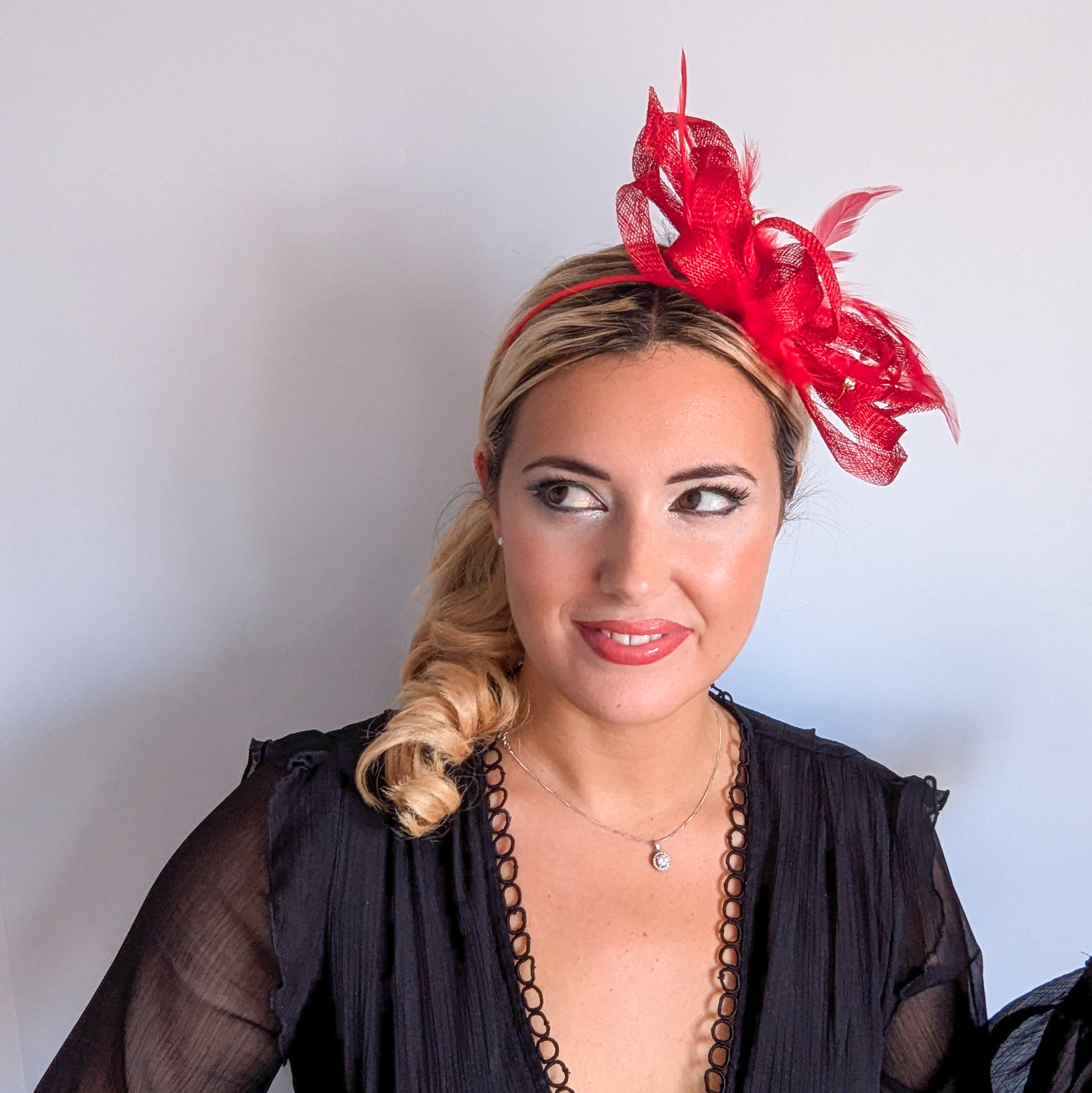 Red crystal feather fascinator hat