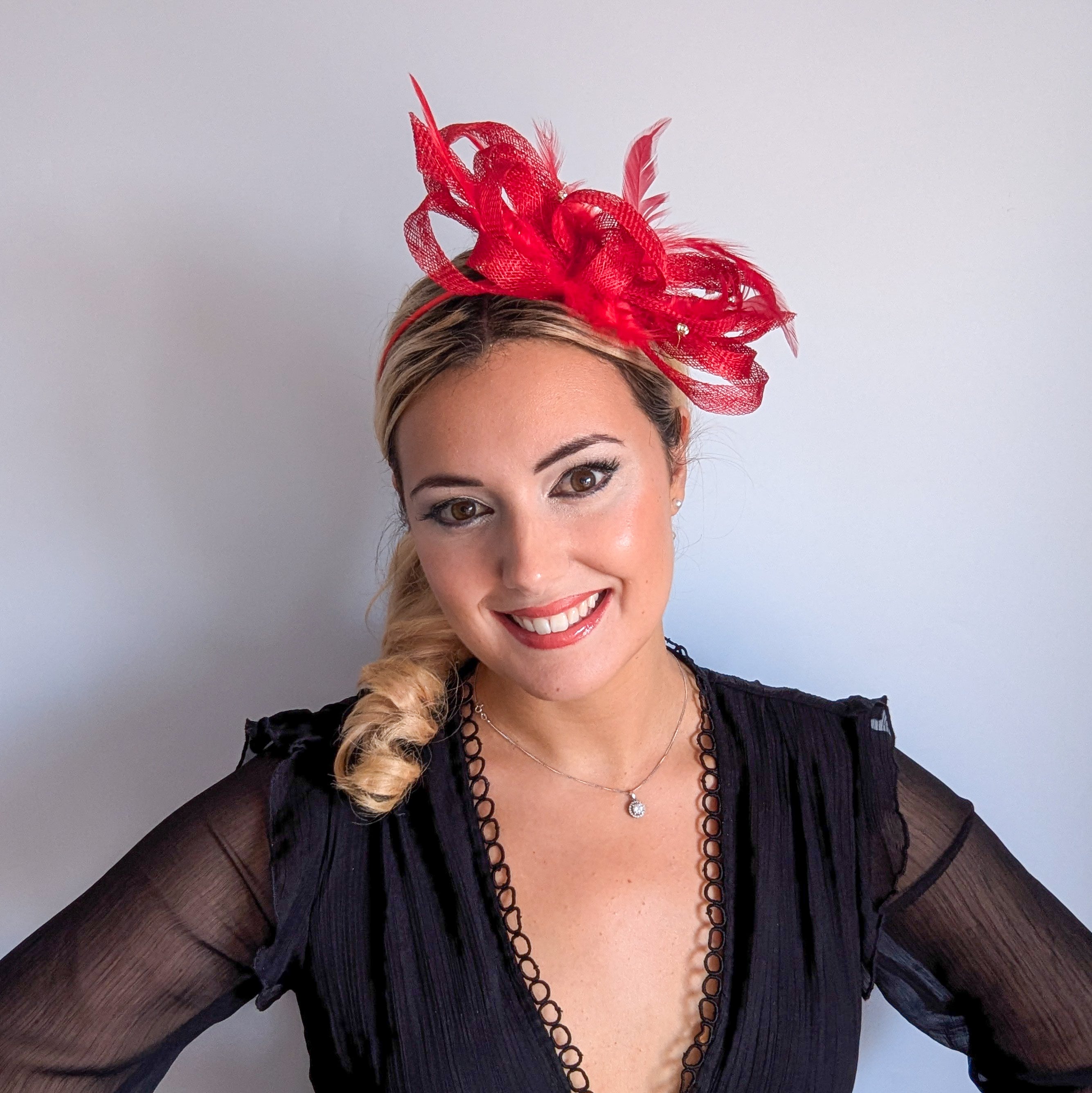 Red crystal feather fascinator hat