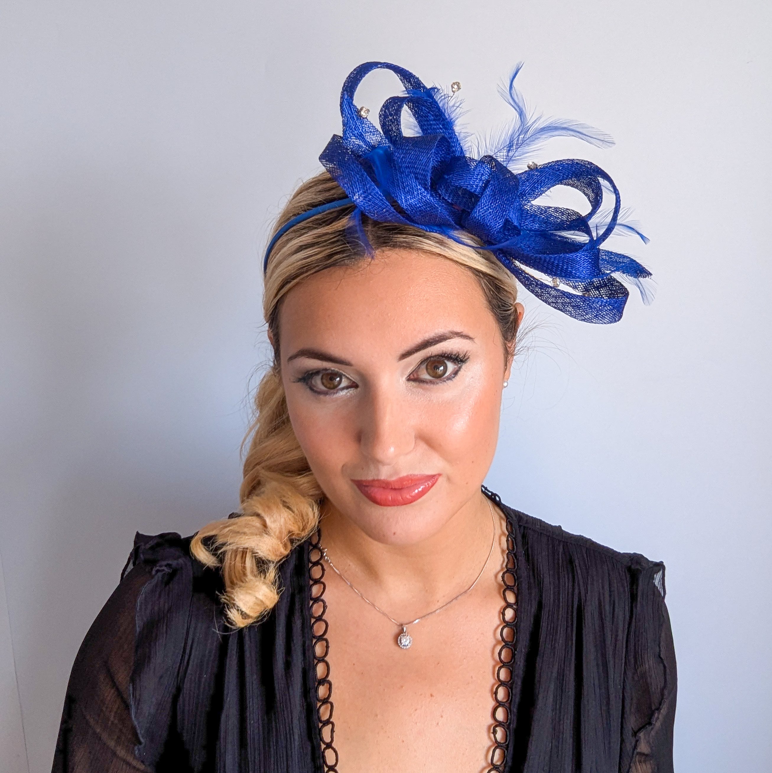 Royal cobalt blue crystal feather fascinator hat