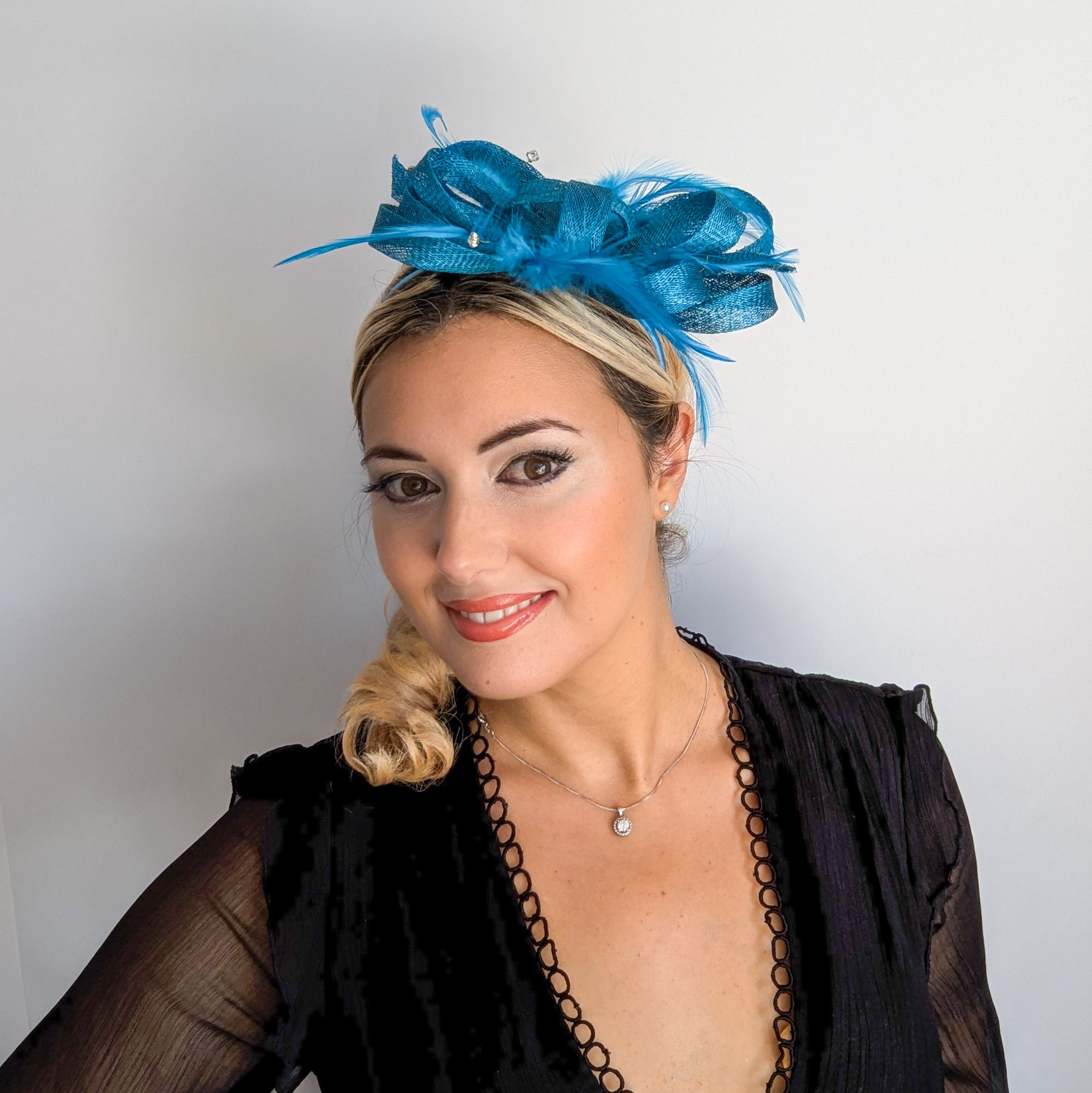 Dark aqua blue crystal feather fascinator hat