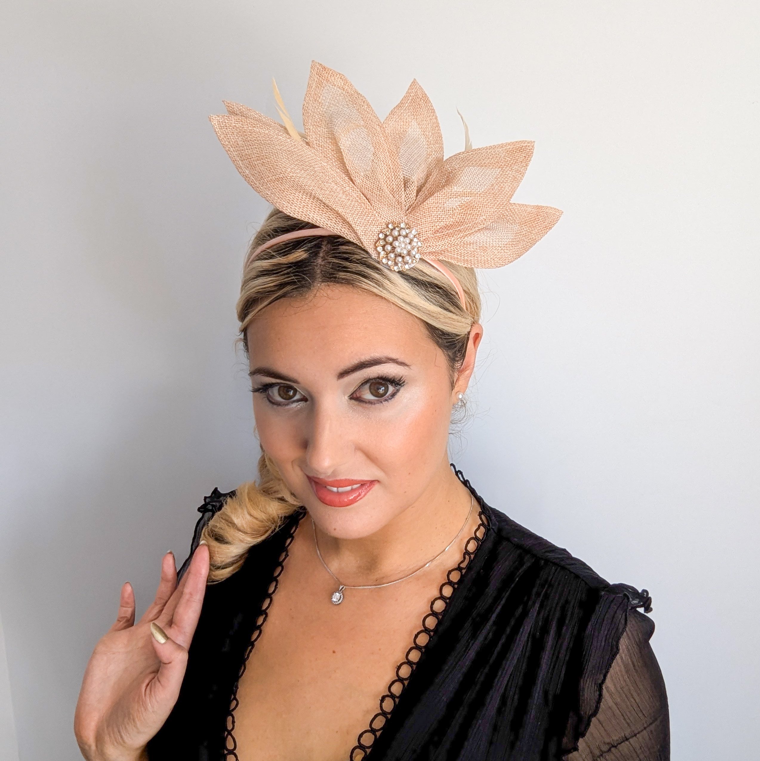Beige peach feather petal fan fascinator hat