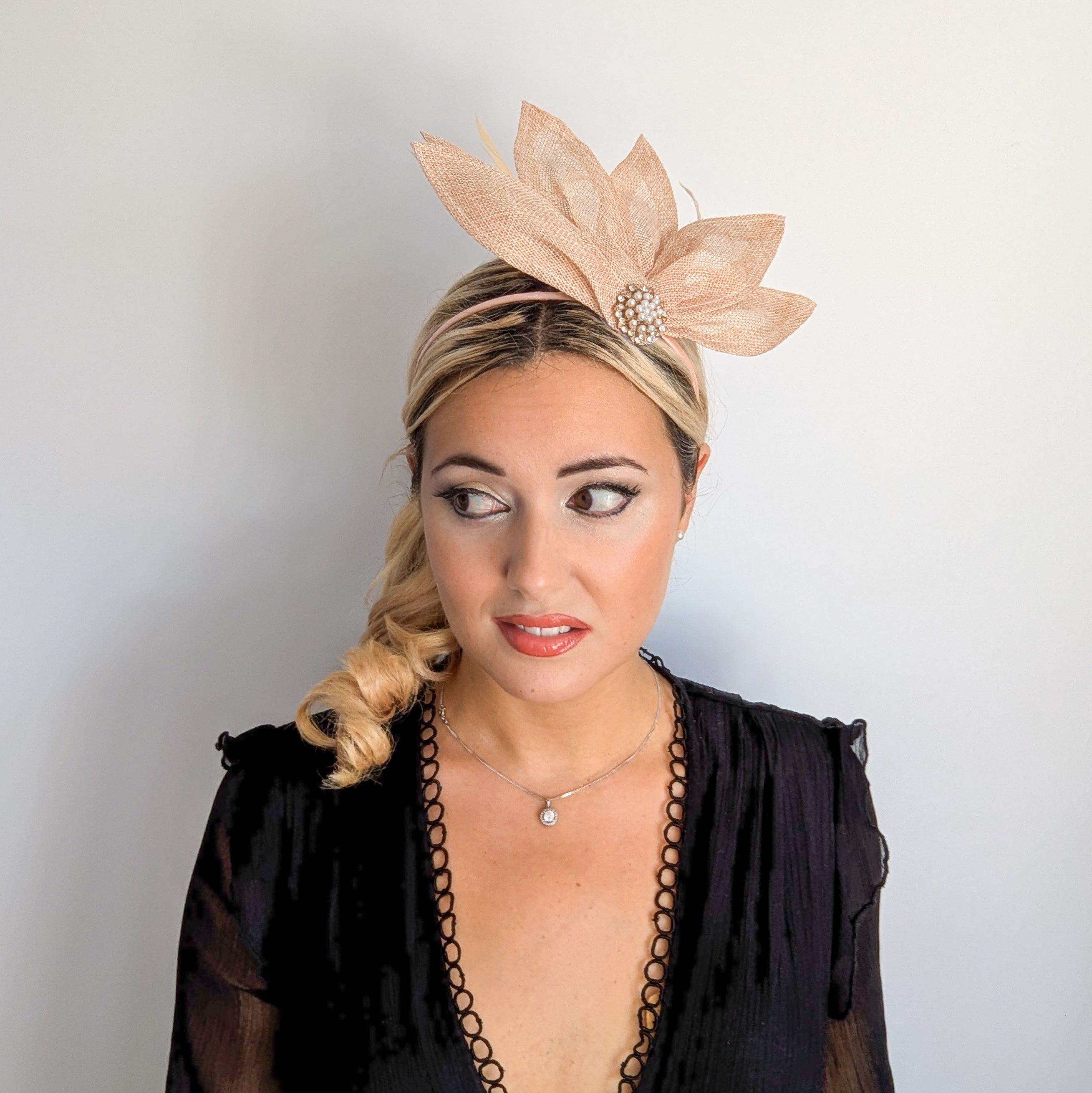 Beige peach feather petal fan fascinator hat