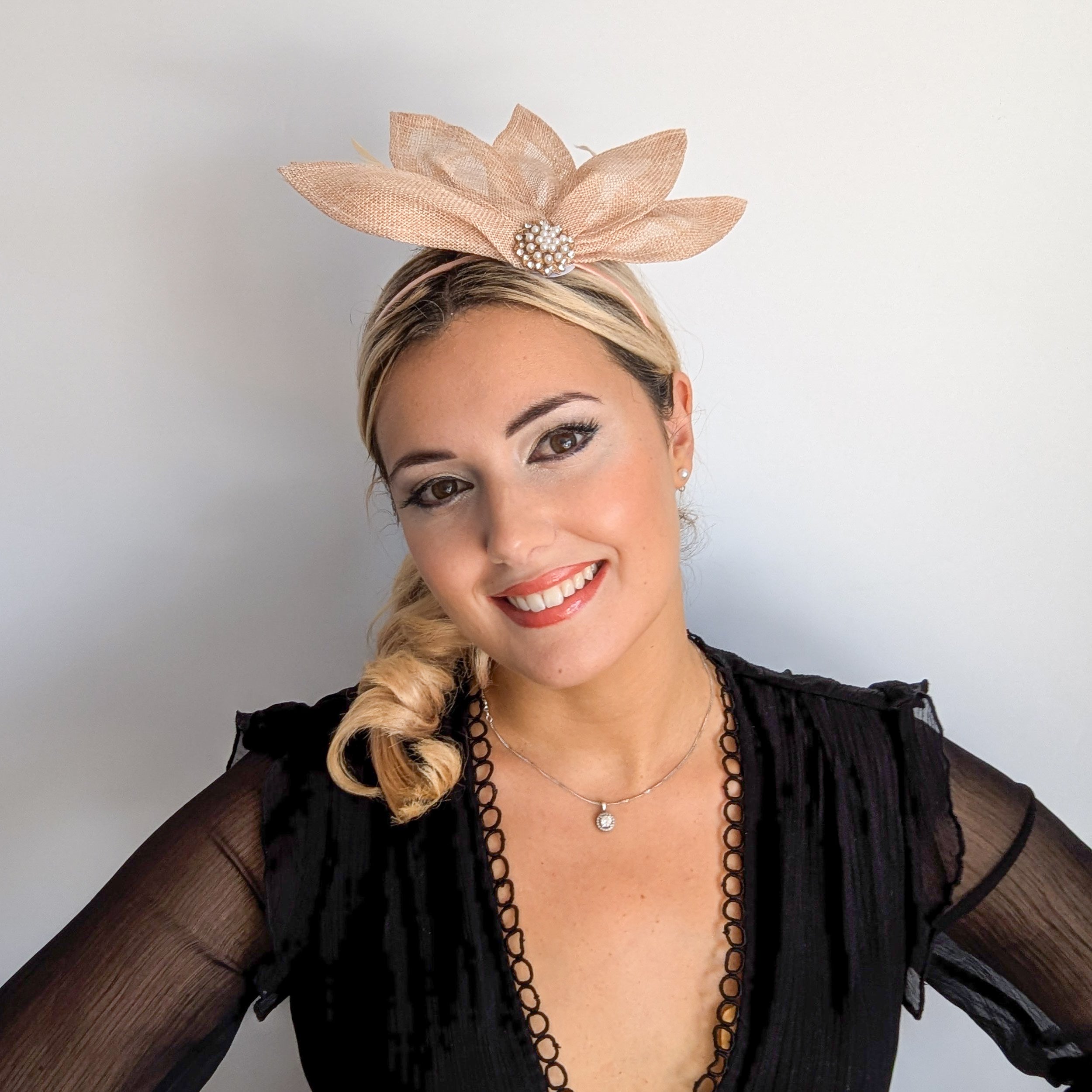 Beige peach feather petal fan fascinator hat