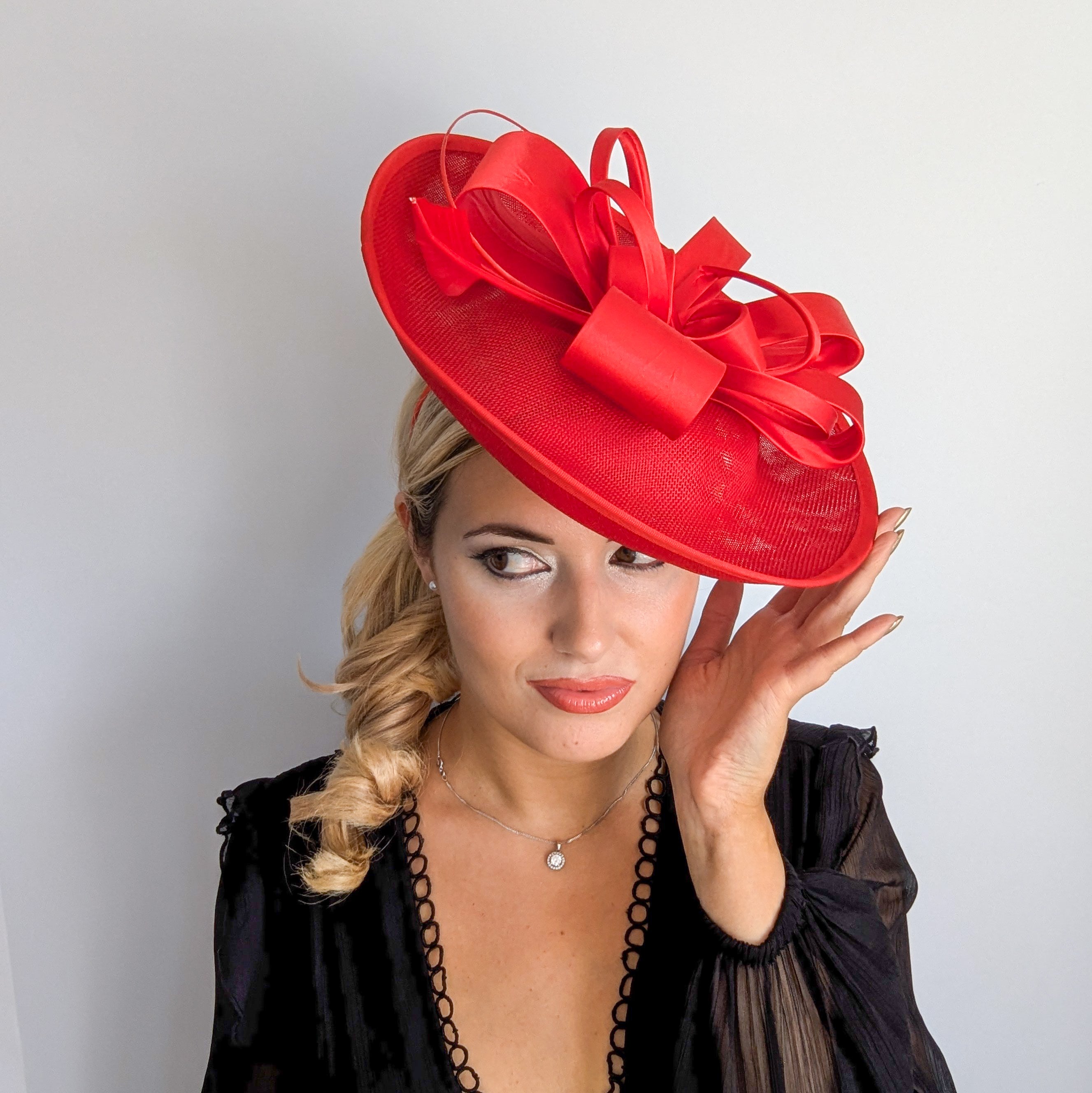Red feather large saucer disc fascinator hat