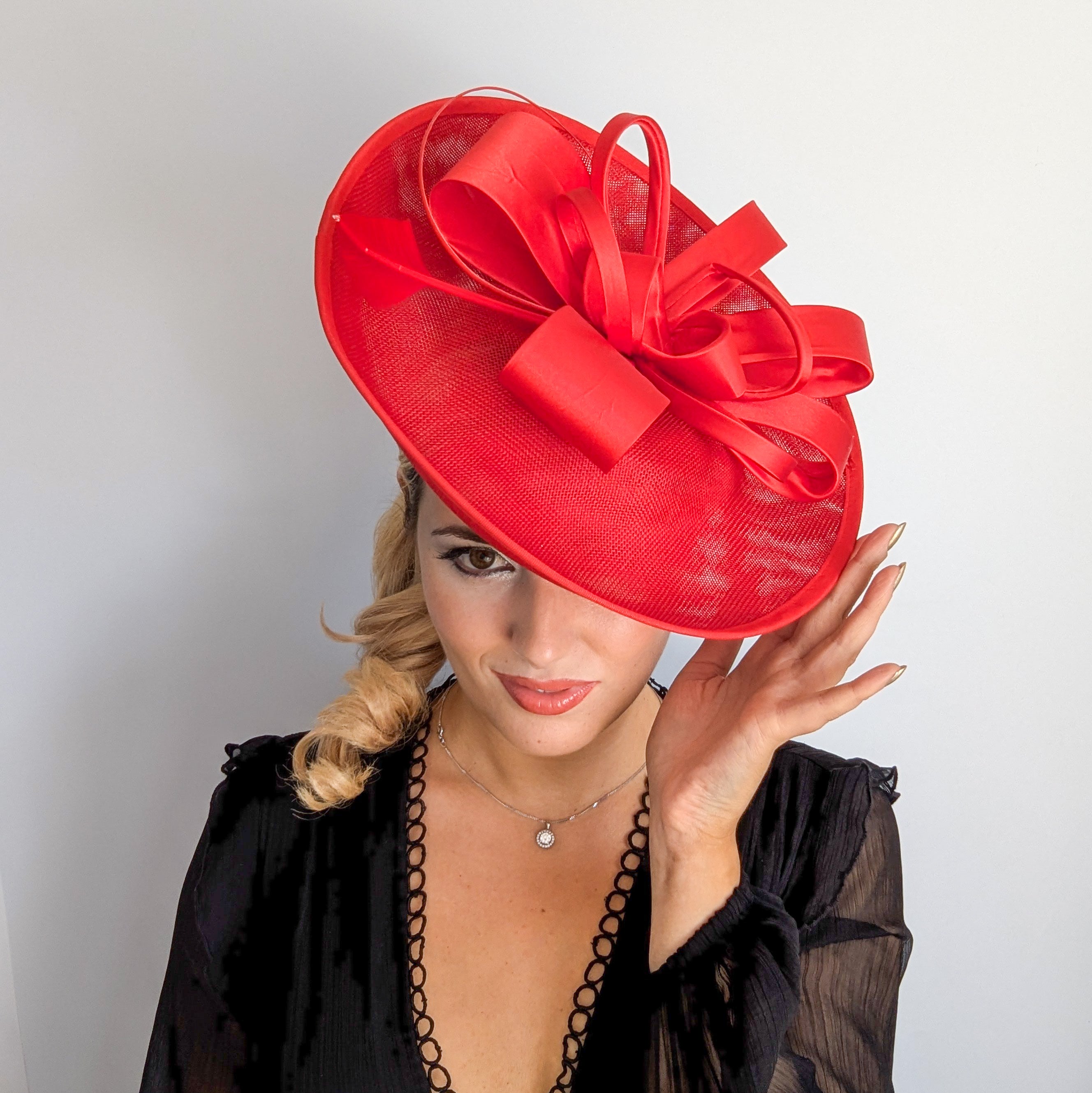 Red feather large saucer disc fascinator hat