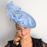 Light cornflower blue large feather saucer disc fascinator hat