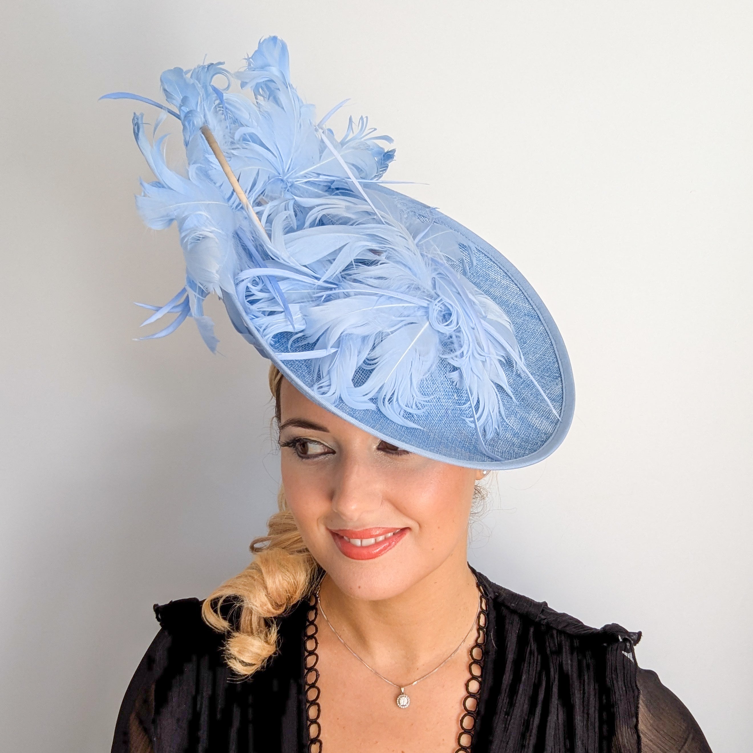 Light cornflower blue large feather saucer disc fascinator hat