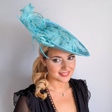 Light turquoise green blue large feather saucer disc fascinator hat