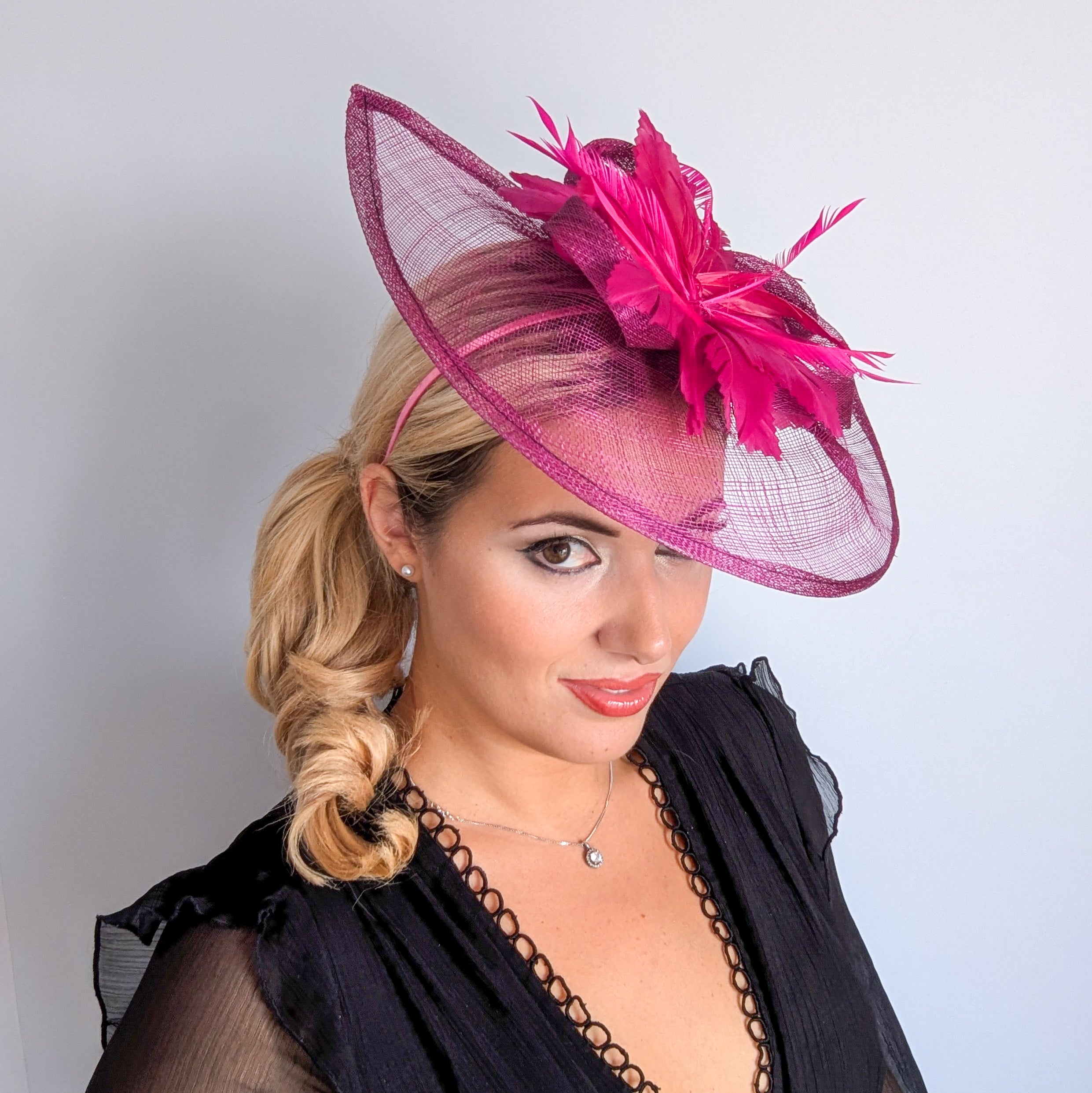 Magenta pink feather large teardrop fascinator hat